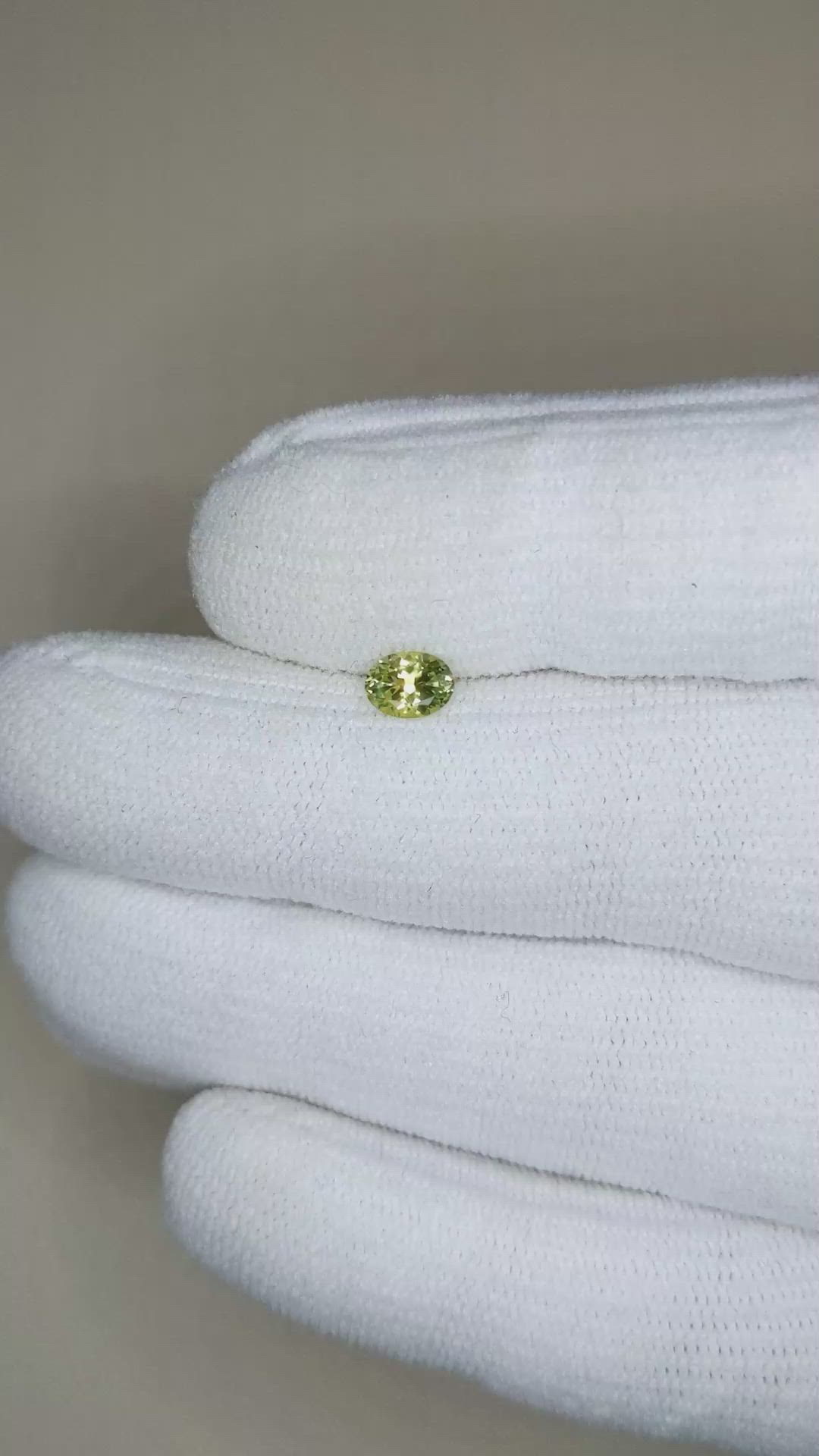 0.46 Ct. Yellowish Green Sapphire from Montana Size Video