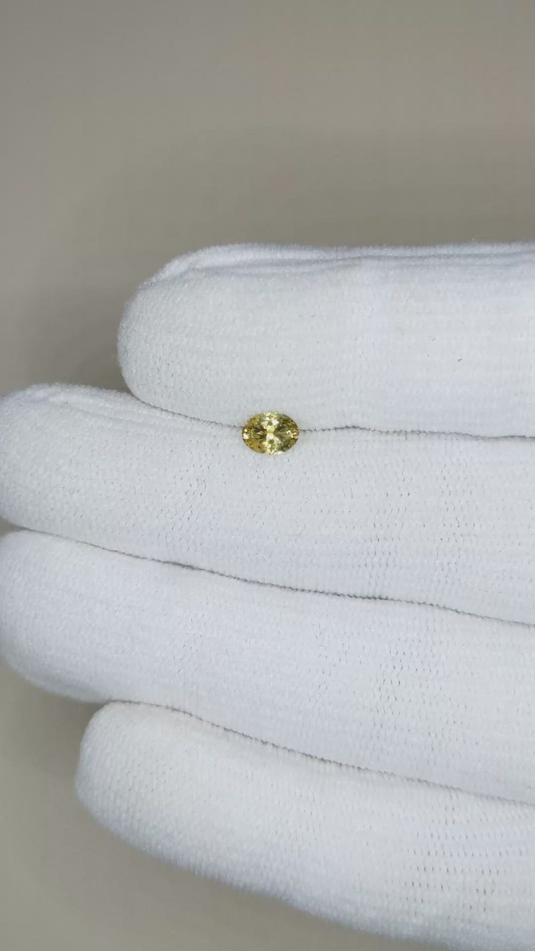 0.46 Ct. Greenish Yellow Sapphire from Montana Size Video