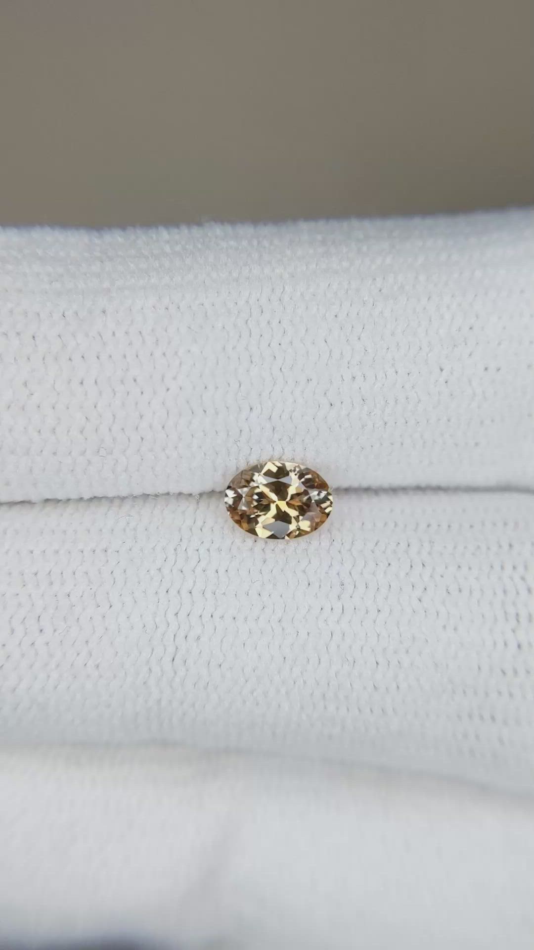 0.48 Ct. Yellowish Brown Sapphire from Montana Size Video