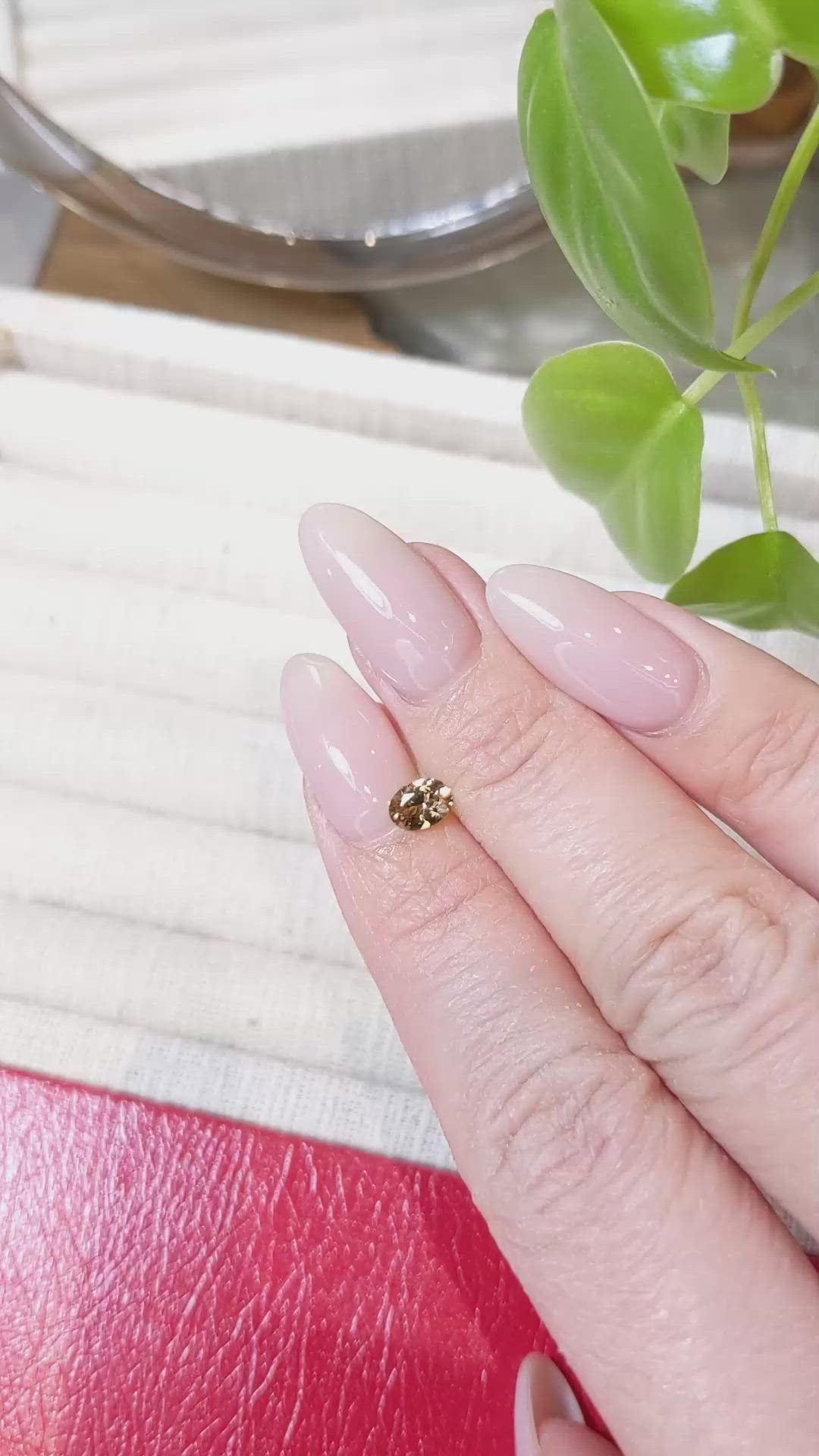 0.48 Ct. Yellowish Brown Sapphire from Montana Size Video