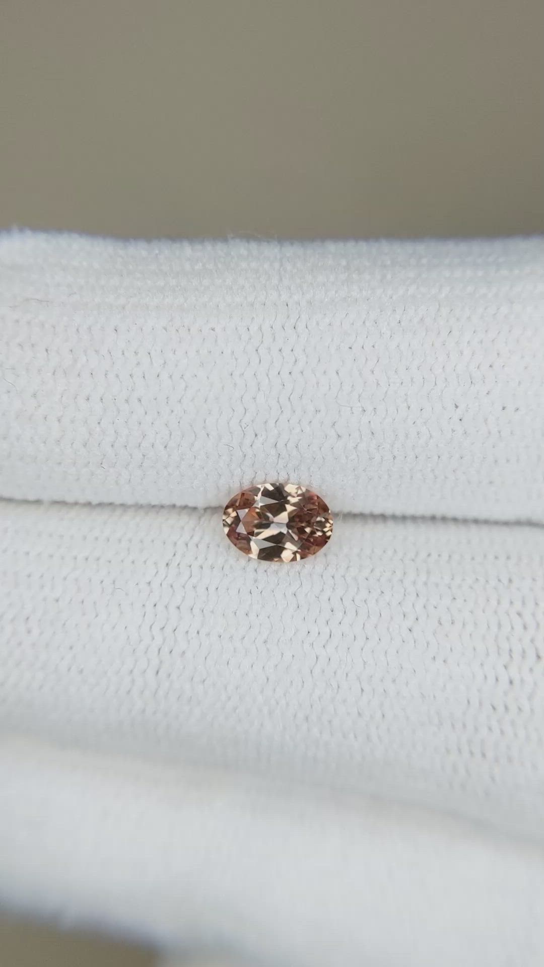 0.49 Ct. Orangish Brown Sapphire from Montana Size Video