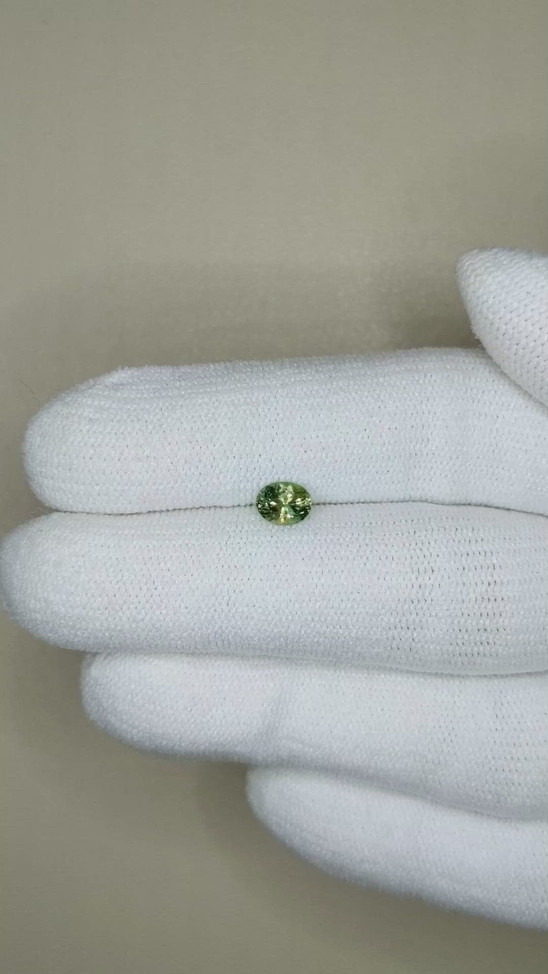 0.50 Ct. Yellowish Green Sapphire from Montana Size Video