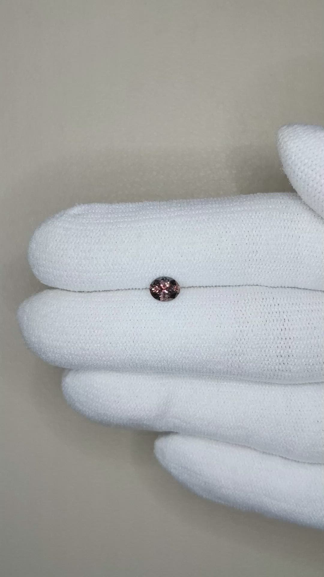 0.51 Ct. Purplish Pink Sapphire from Montana Size Video