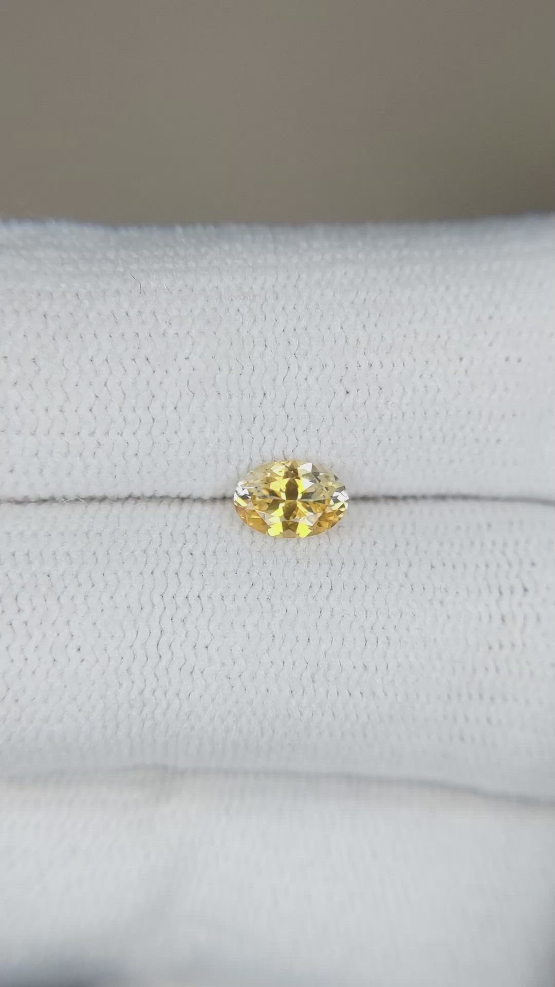 0.52 Ct. Yellow Sapphire from Montana Size Video