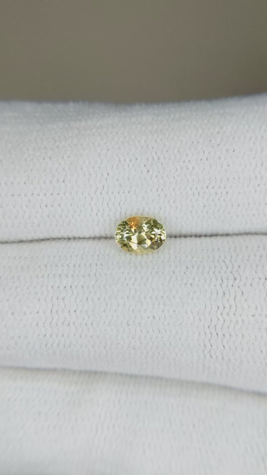 0.53 Ct. Greenish Yellow Sapphire from Montana Size Video