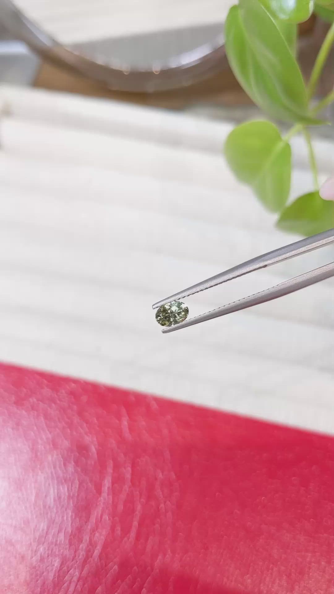 0.54 Ct. Yellowish Green Sapphire from Montana Size Video