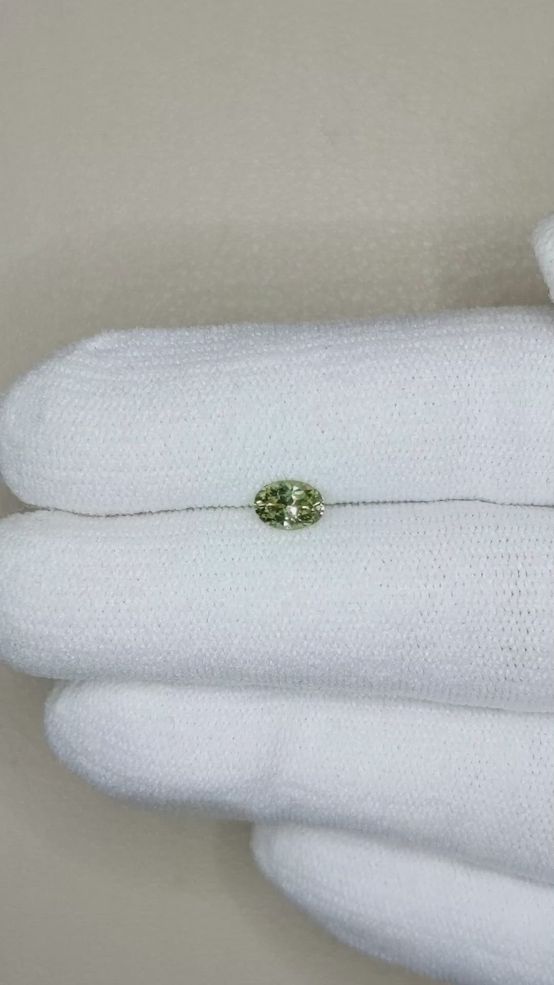 0.54 Ct. Yellowish Green Sapphire from Montana Size Video