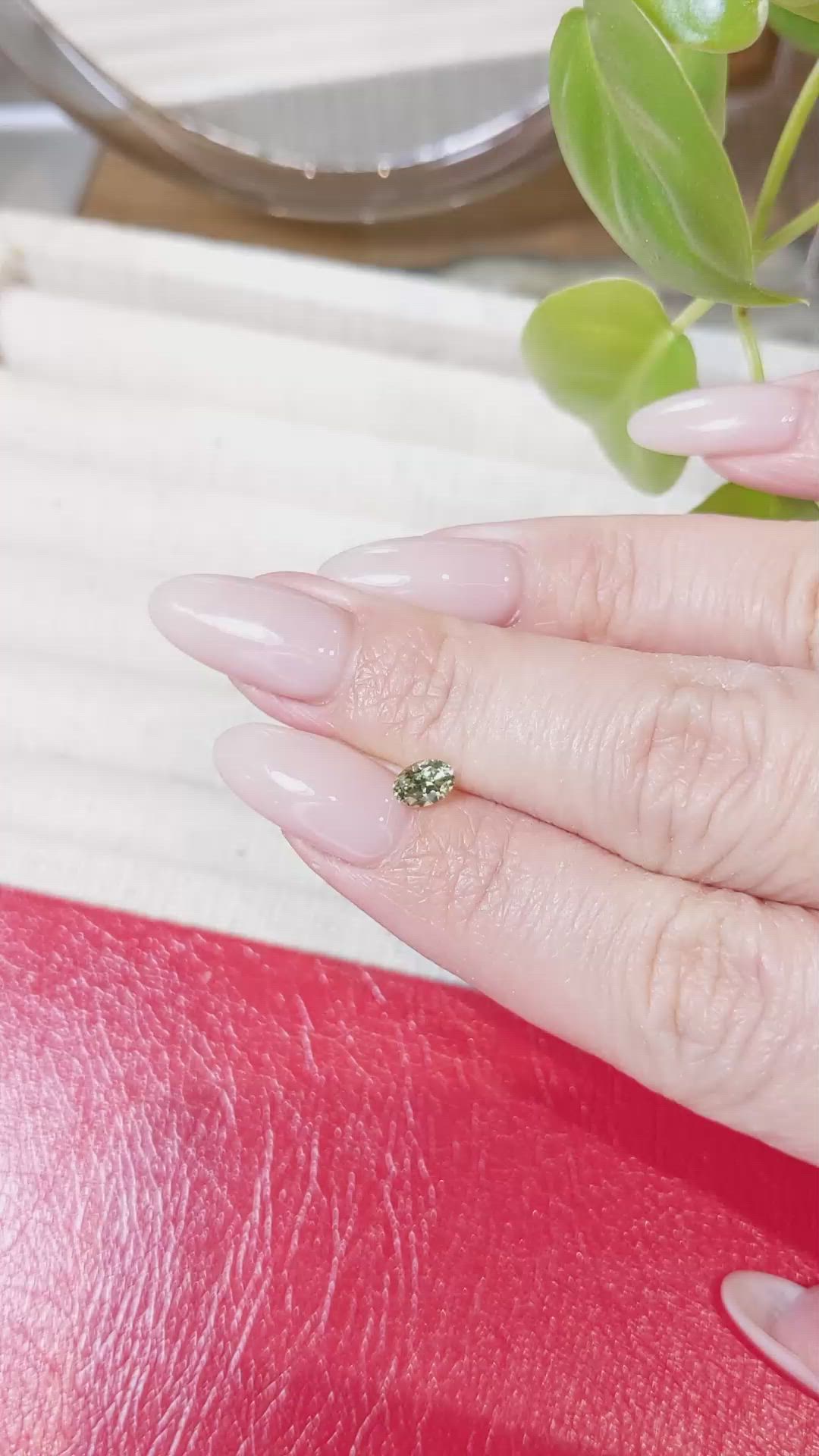 0.54 Ct. Yellowish Green Sapphire from Montana Size Video