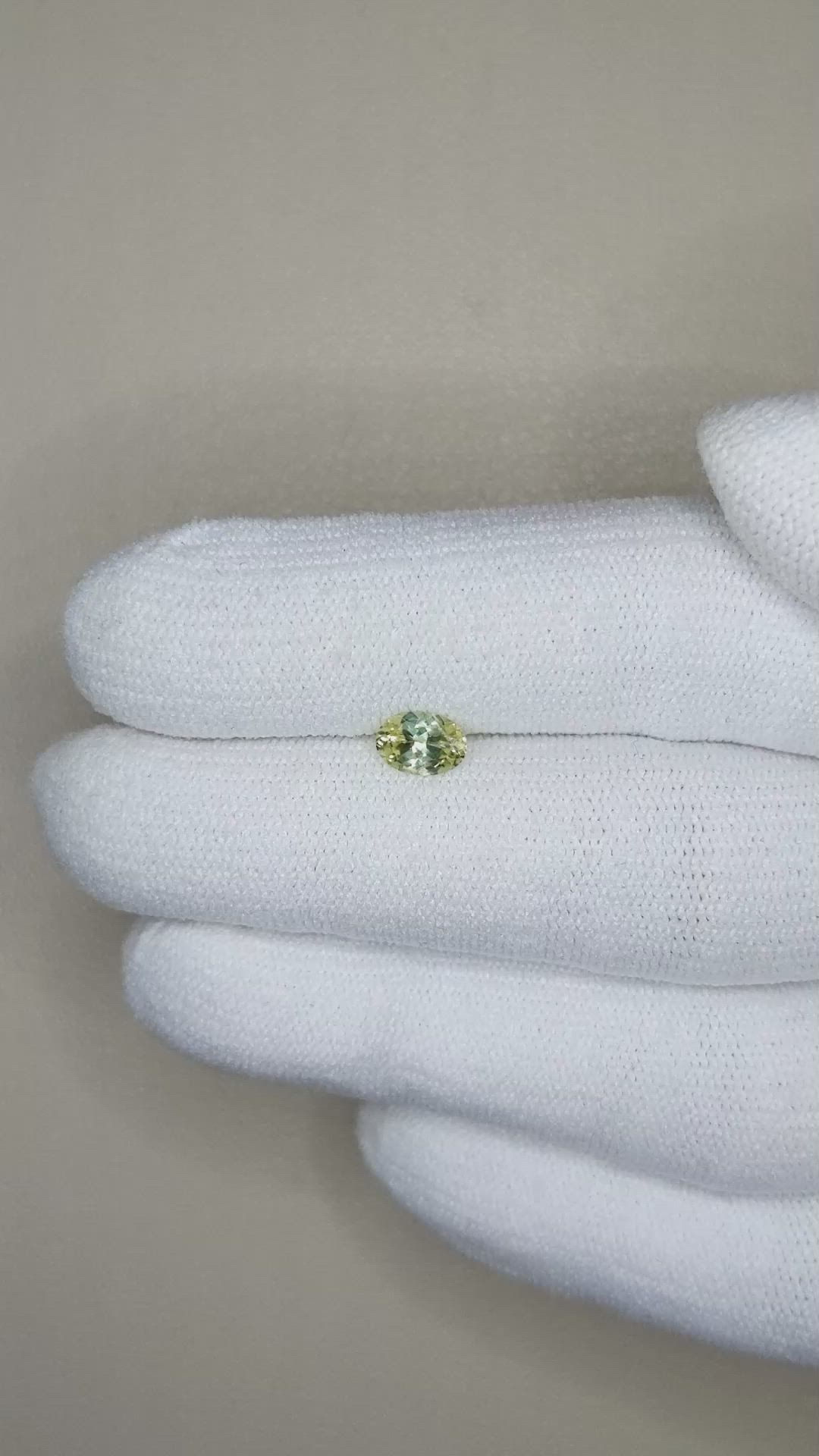 0.56 Ct. Greenish Yellow Sapphire from Montana Size Video