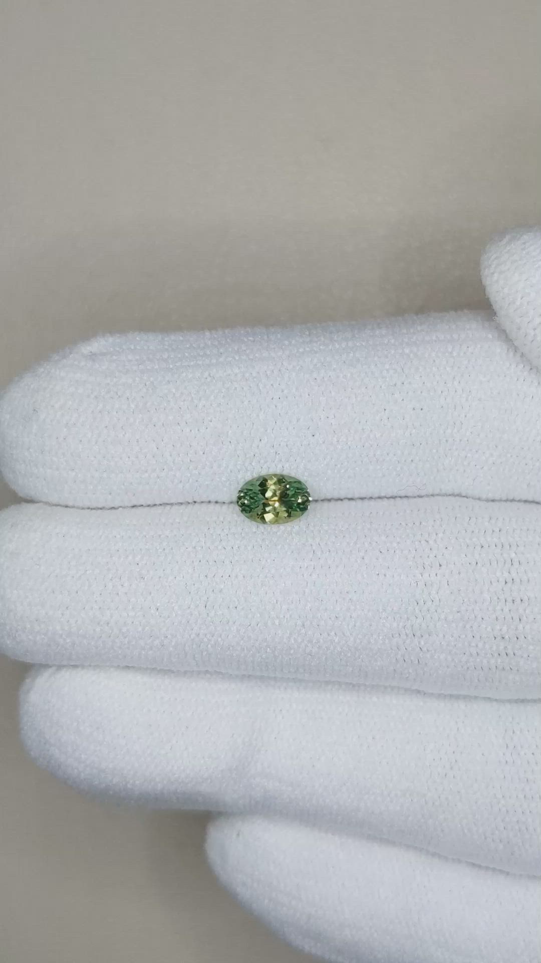 0.57 Ct. Yellowish Green Sapphire from Montana Size Video