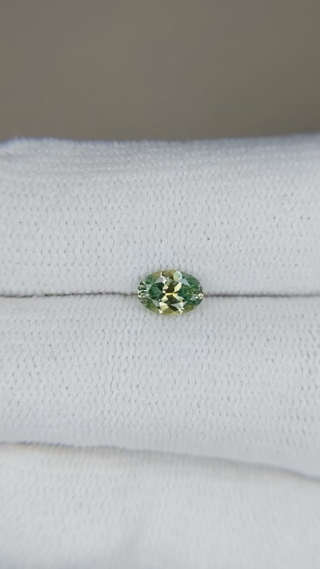 0.57 Ct. Yellowish Green Sapphire from Montana Size Video