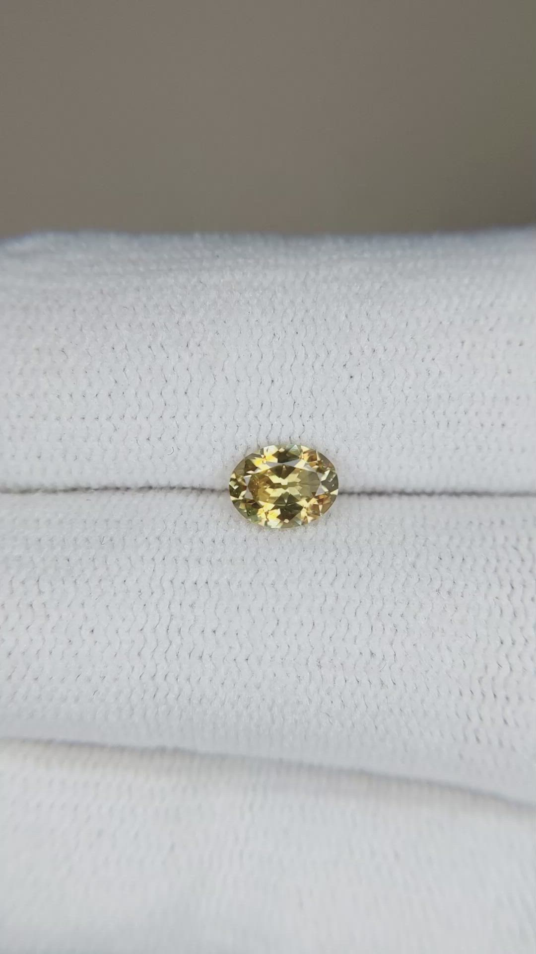 0.58 Ct. Greenish Yellow Sapphire from Montana Size Video