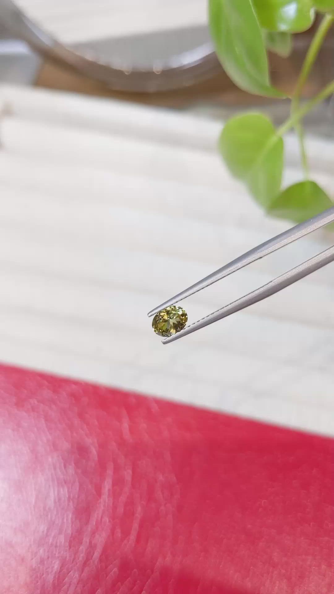 0.58 Ct. Greenish Yellow Sapphire from Montana Size Video