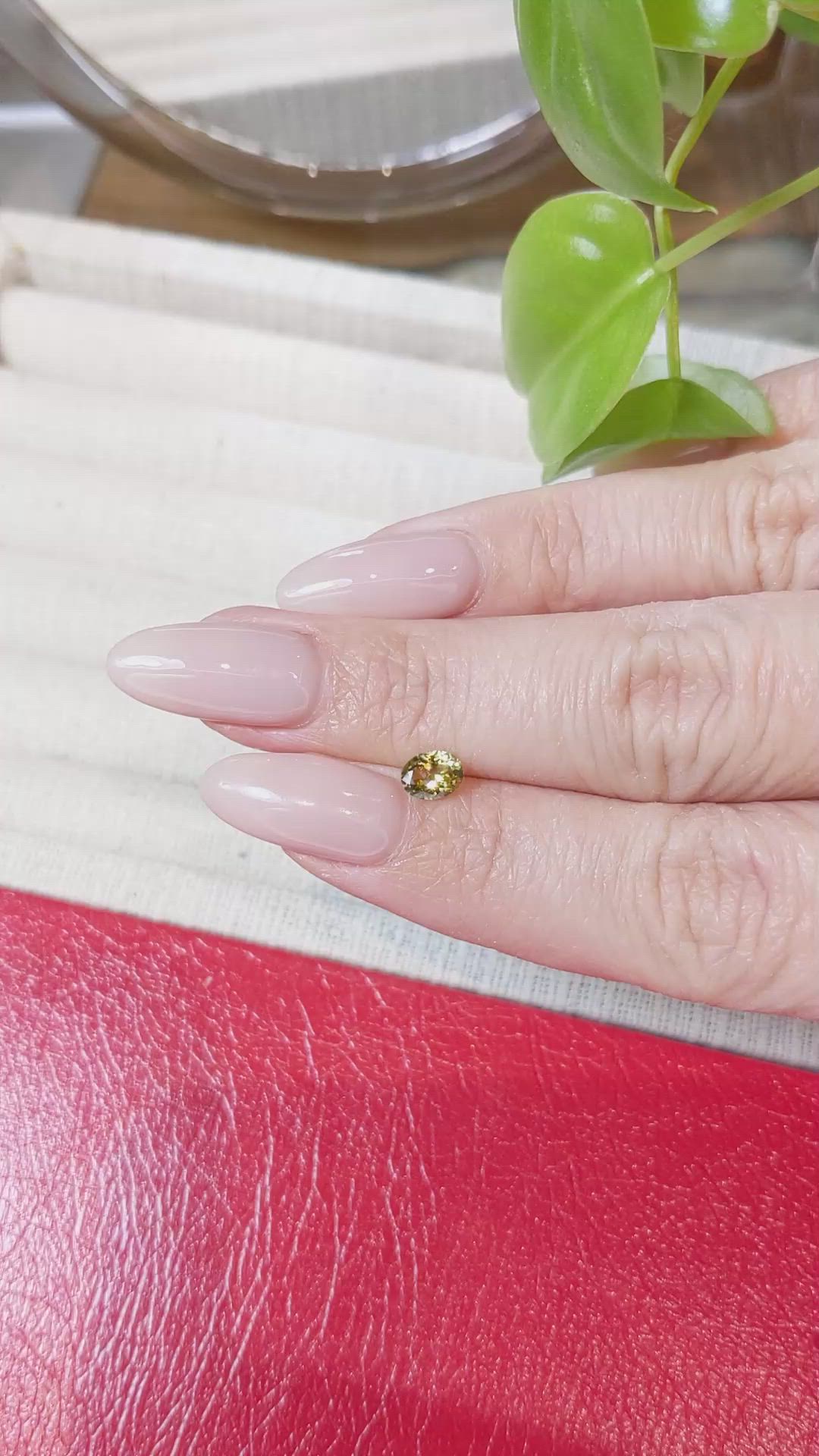 0.58 Ct. Greenish Yellow Sapphire from Montana Size Video