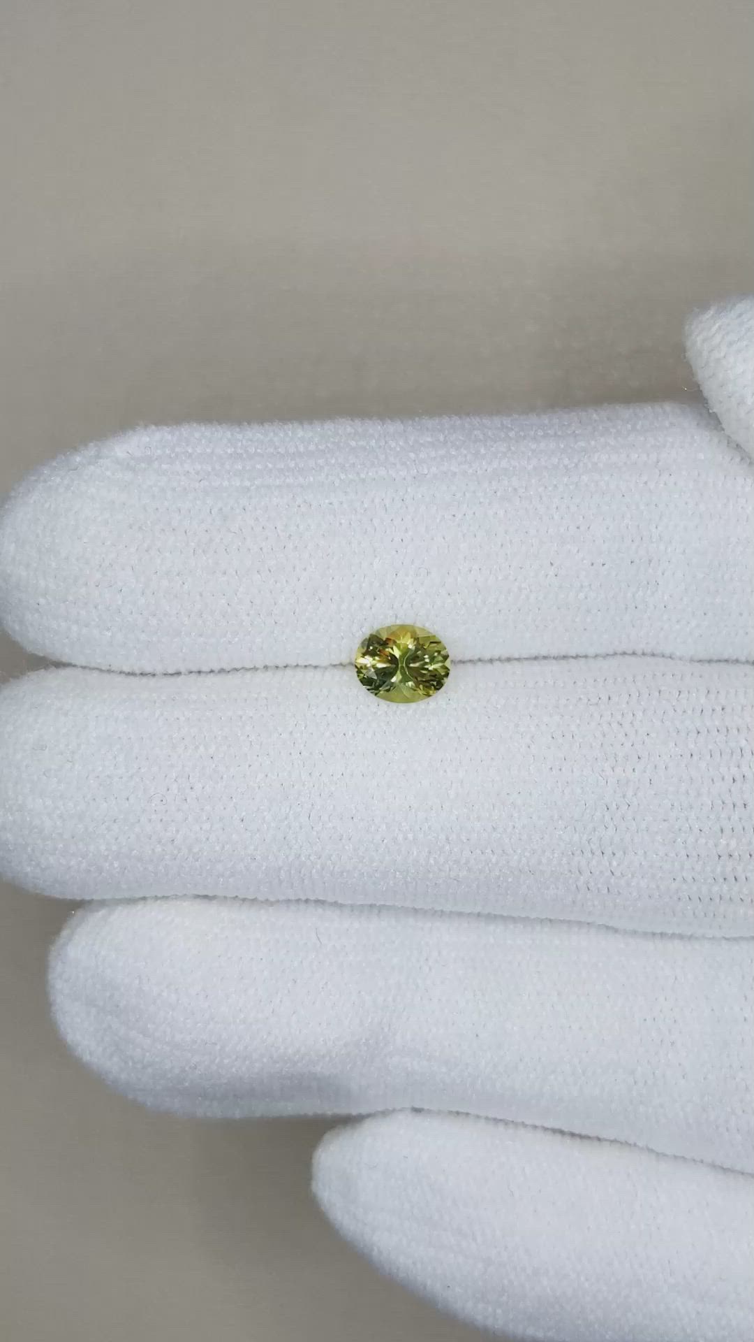 0.58 Ct. Greenish Yellow Sapphire from Montana Size Video