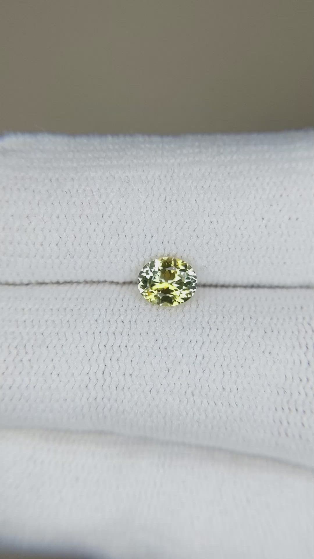 0.59 Ct. Greenish Yellow Sapphire from Montana Size Video