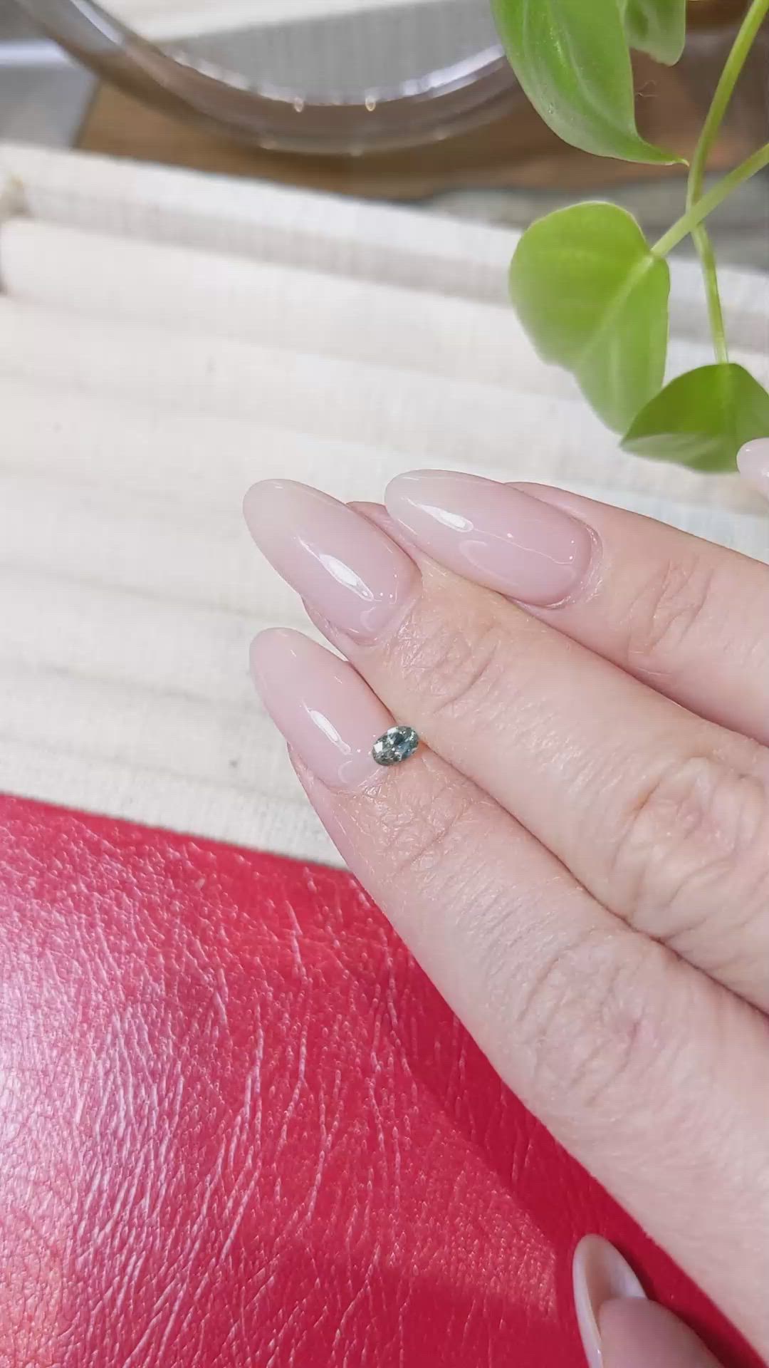 0.21 Ct. Bluish Green Sapphire from Montana Size Video