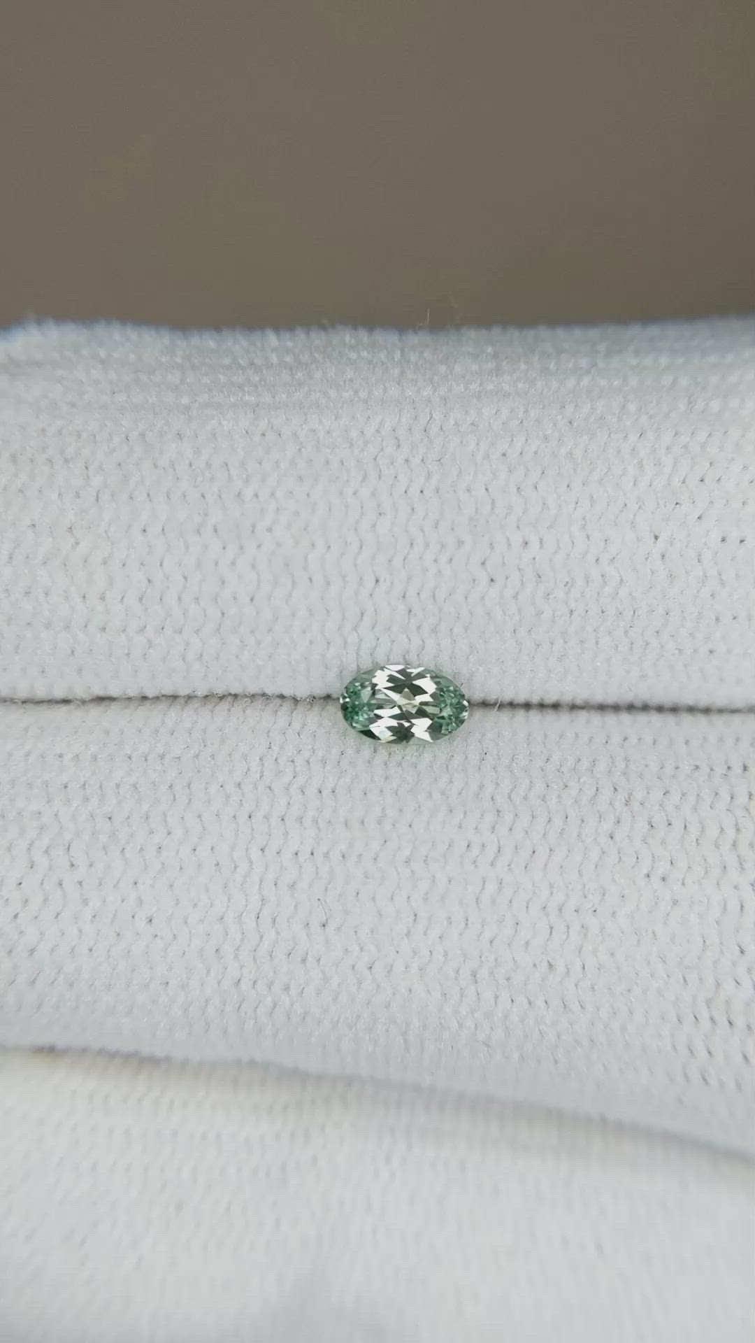 0.23 Ct. Yellowish Green Sapphire from Montana Size Video