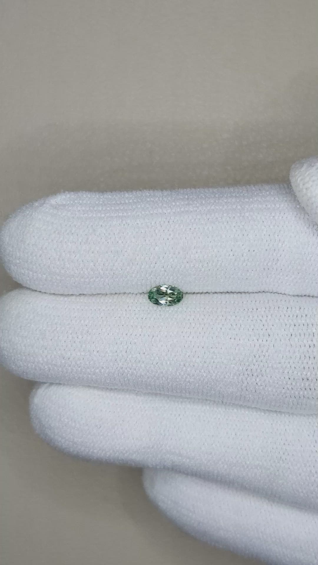 0.23 Ct. Yellowish Green Sapphire from Montana Size Video