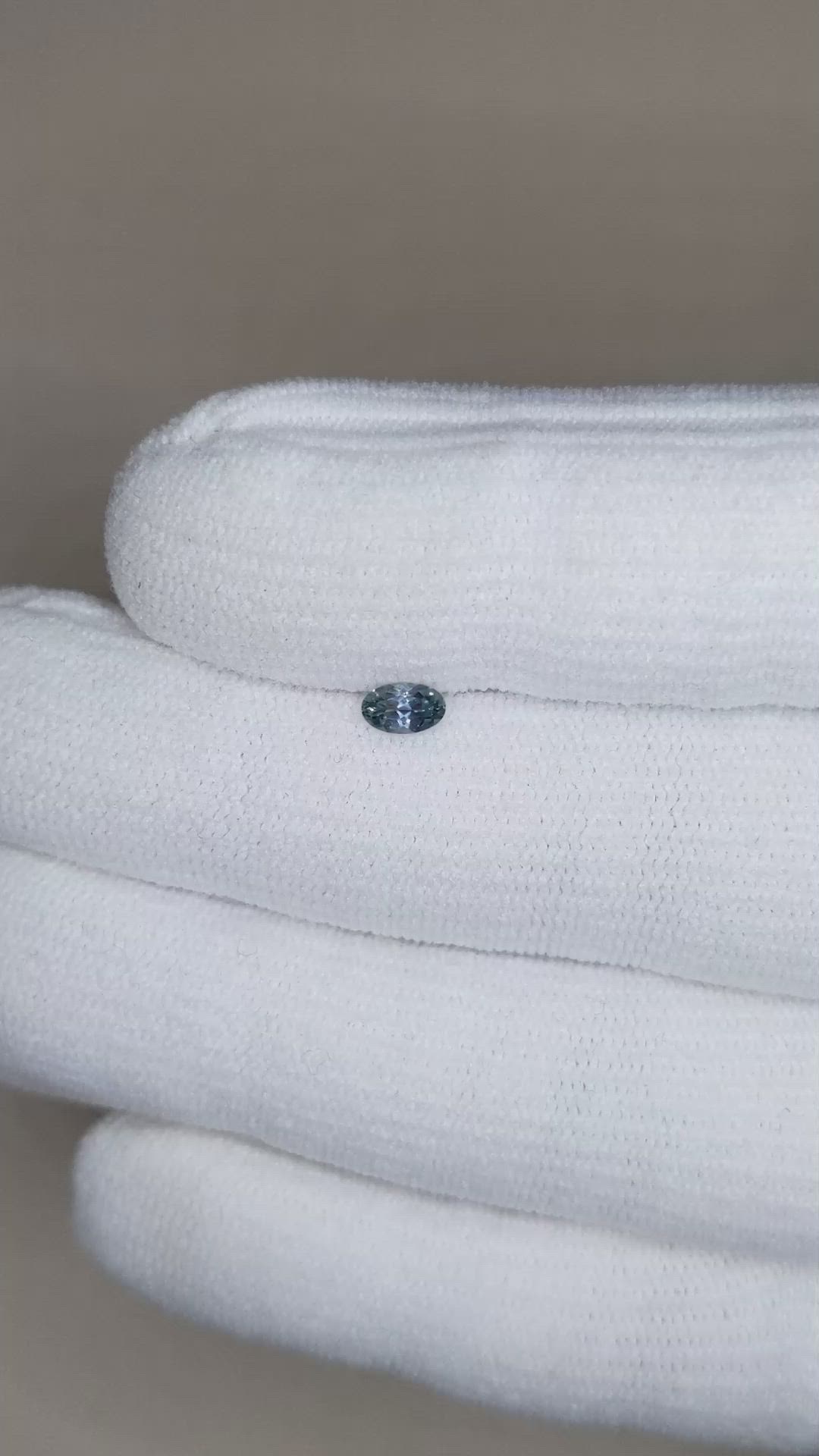 0.26 Ct. Greyish Blue Sapphire from Montana Size Video