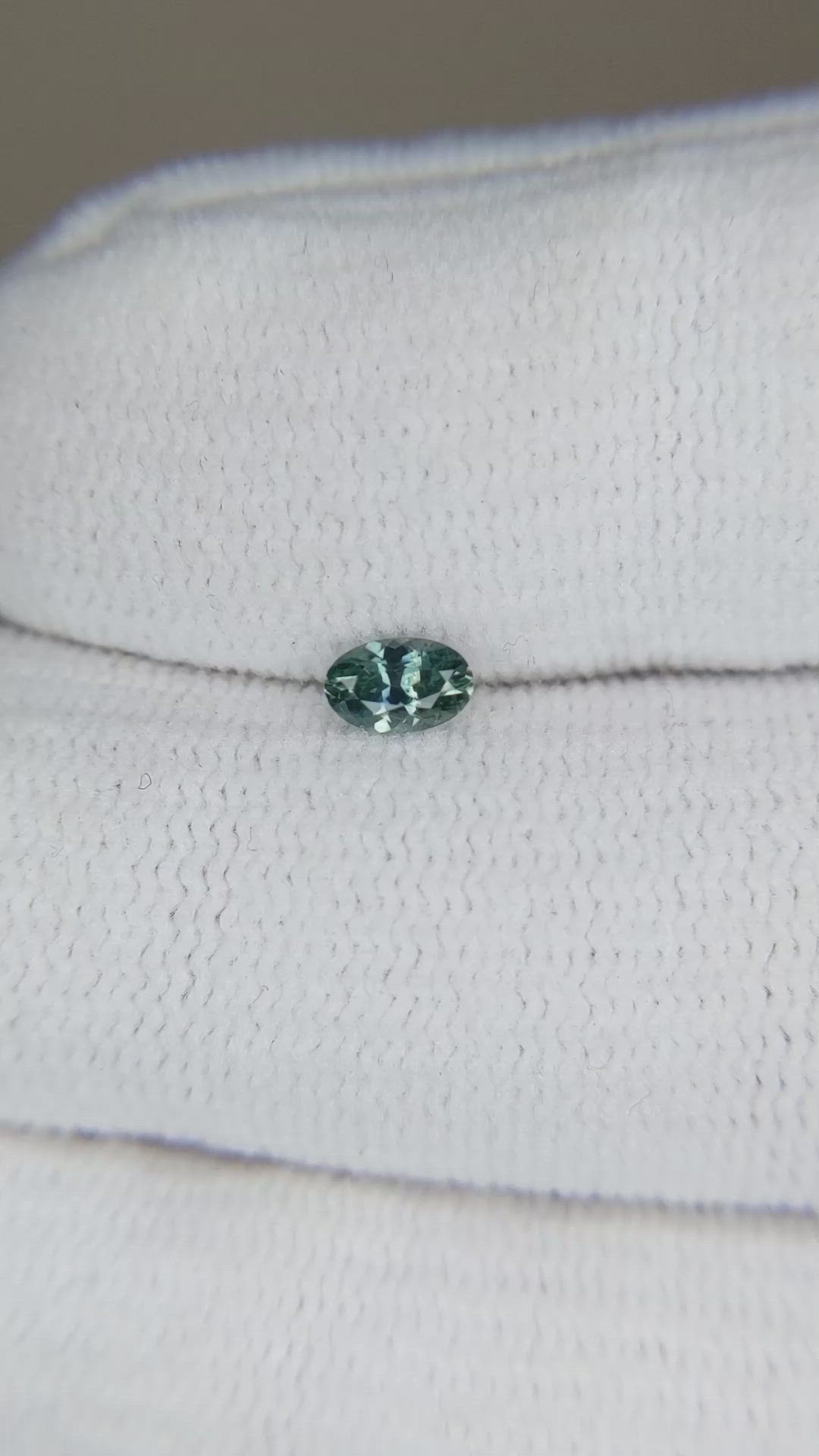 0.28 Ct. Bluish Green Sapphire from Montana Size Video