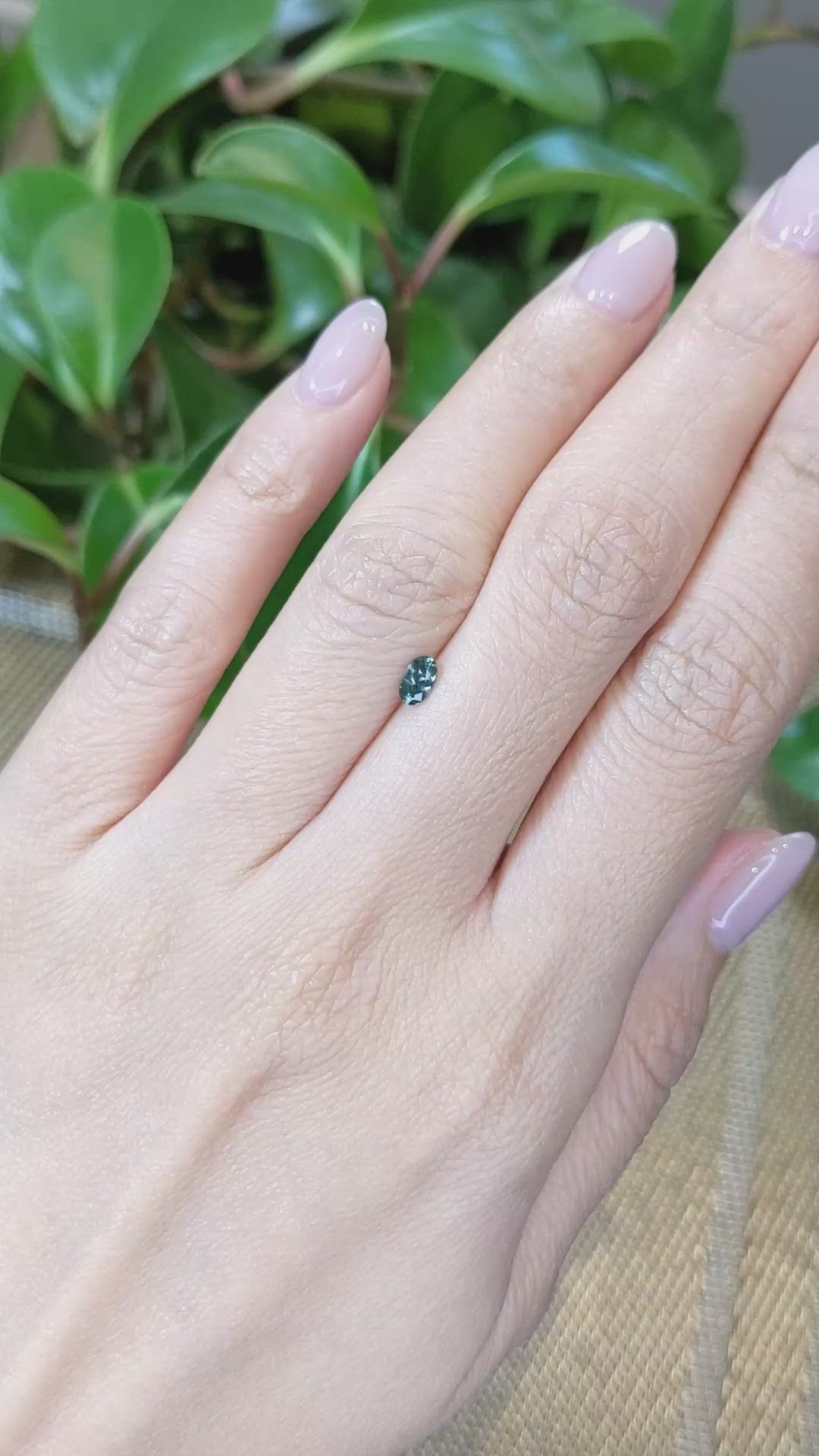 0.28 Ct. Bluish Green Sapphire from Montana Size Video