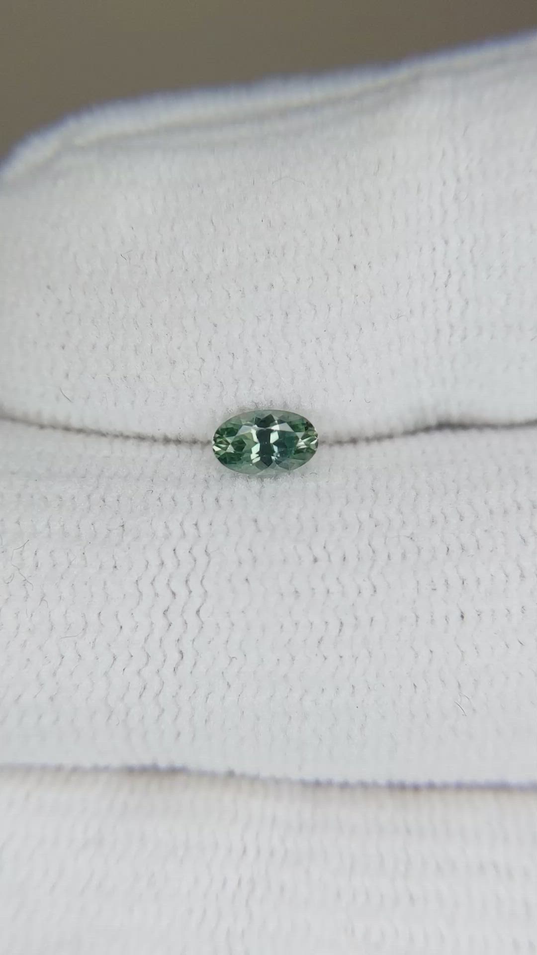 0.28 Ct. Bluish Green Sapphire from Montana Size Video