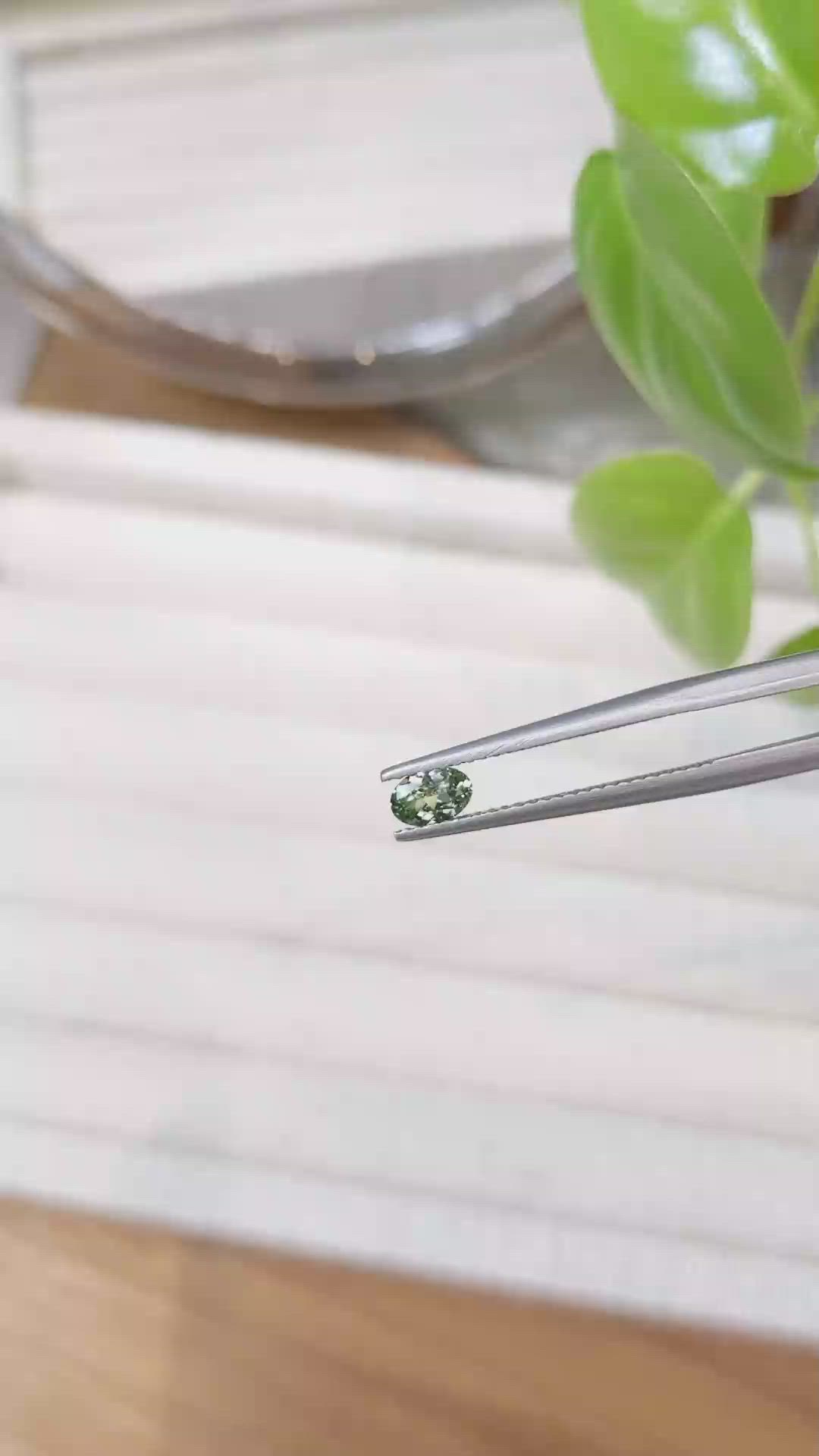 0.34 Ct. Yellowish Green Sapphire from Montana Size Video