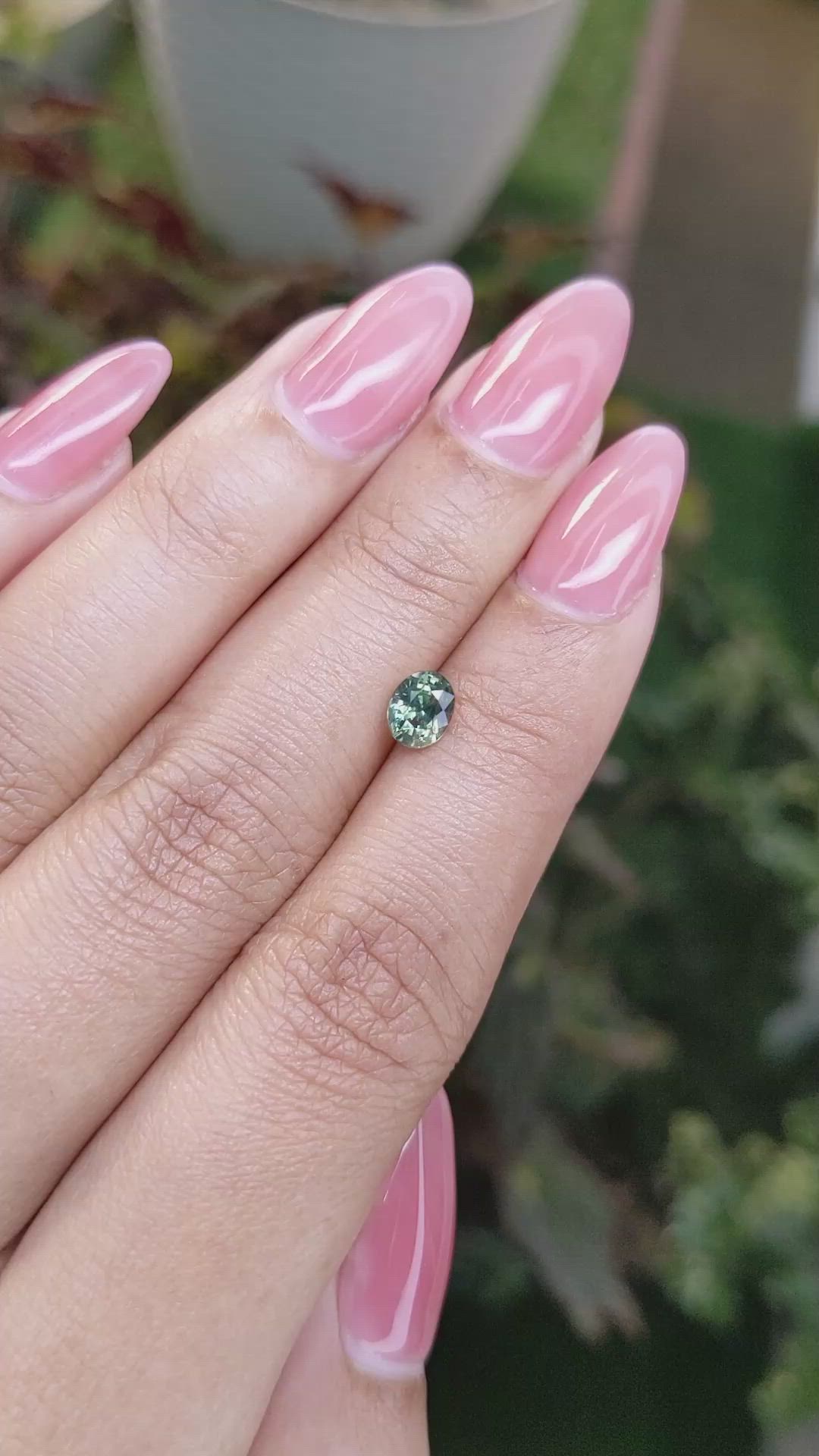 0.88 Ct. Yellowish Green Sapphire from Madagascar Size Video