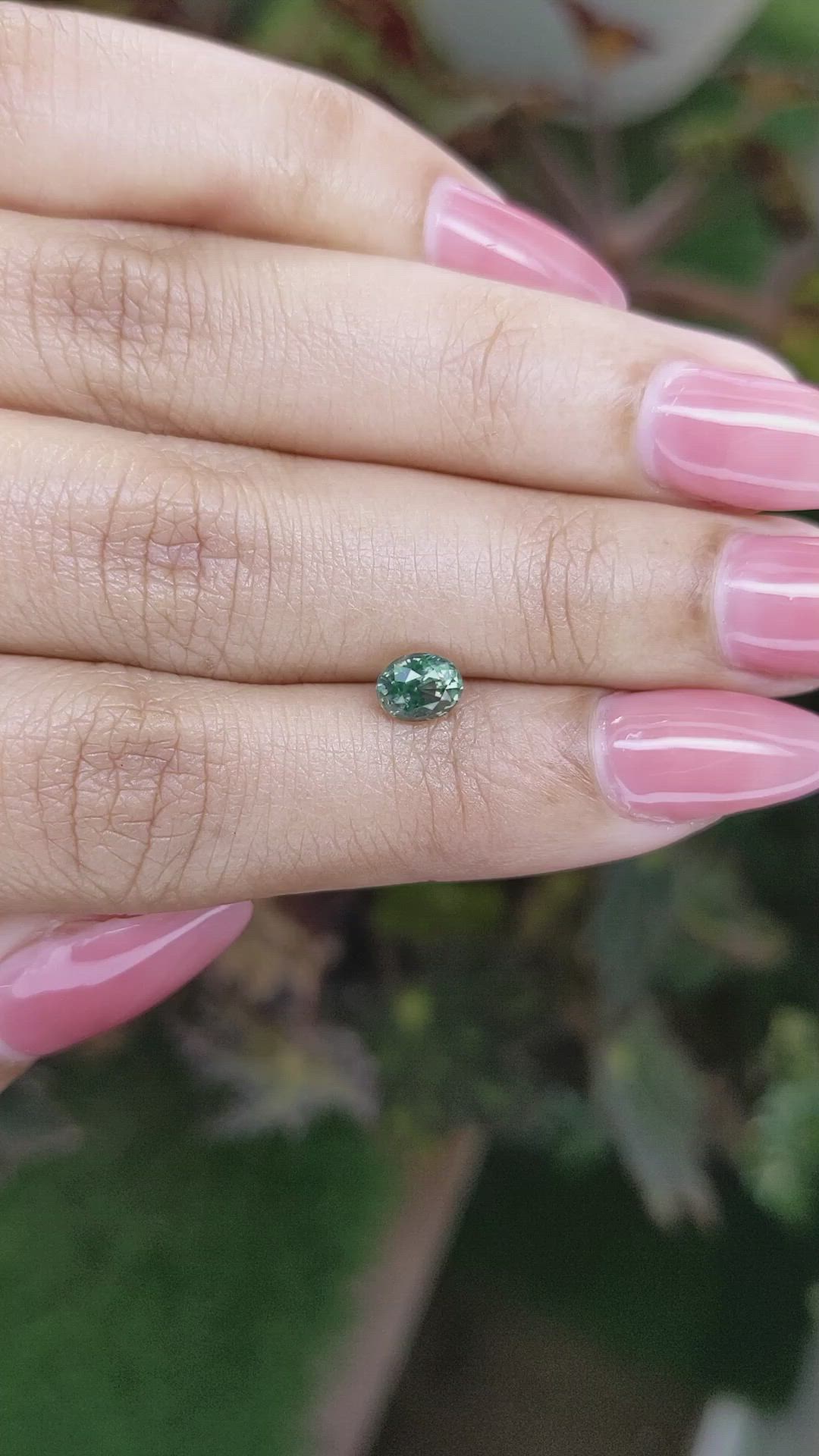 0.88 Ct. Yellowish Green Sapphire from Madagascar Size Video