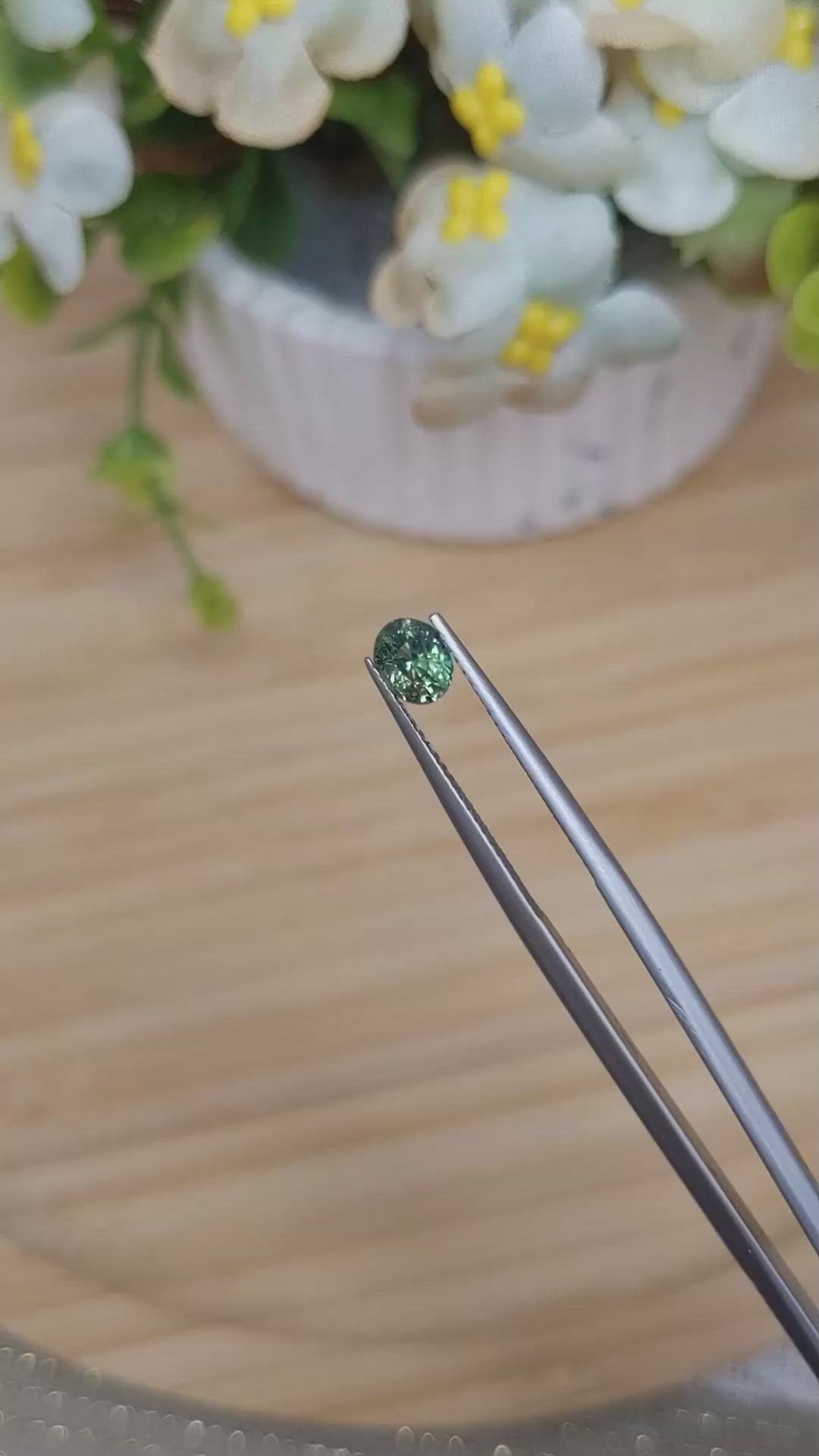 0.88 Ct. Yellowish Green Sapphire from Madagascar Size Video