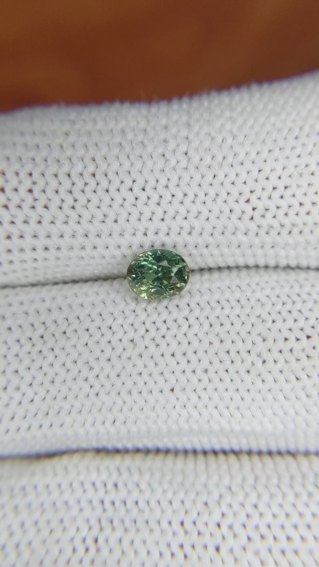 0.88 Ct. Yellowish Green Sapphire from Madagascar Size Video
