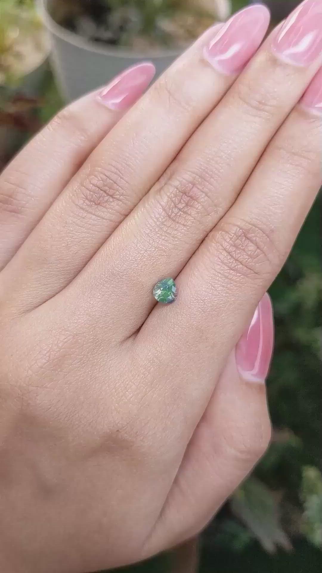 0.91 Ct. Bluish Green Sapphire from Madagascar Size Video