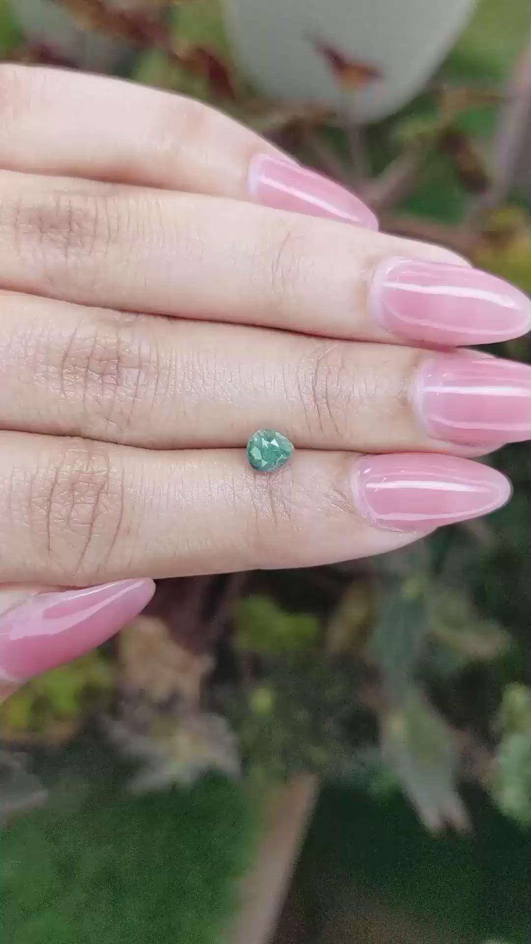 0.91 Ct. Bluish Green Sapphire from Madagascar Size Video