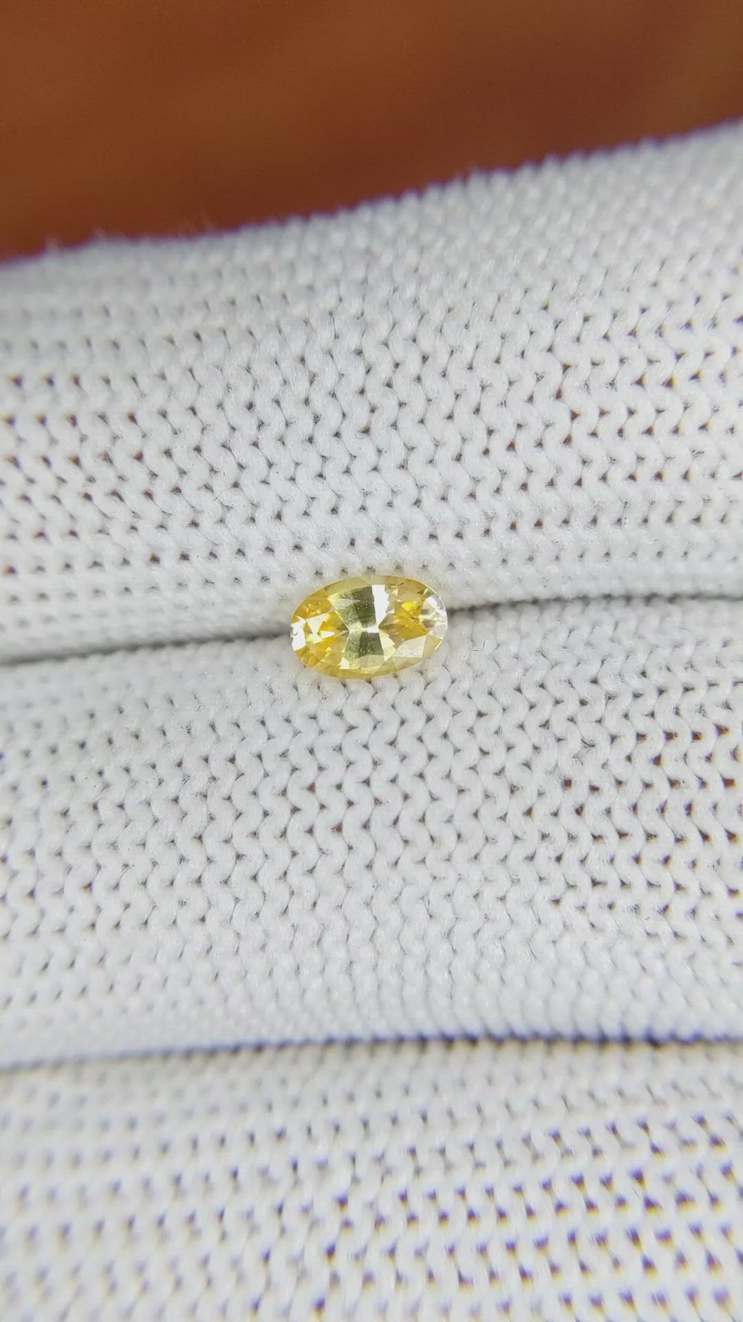0.52 Ct. Orangish Yellow Sapphire from Ceylon (Sri Lanka) Size Video