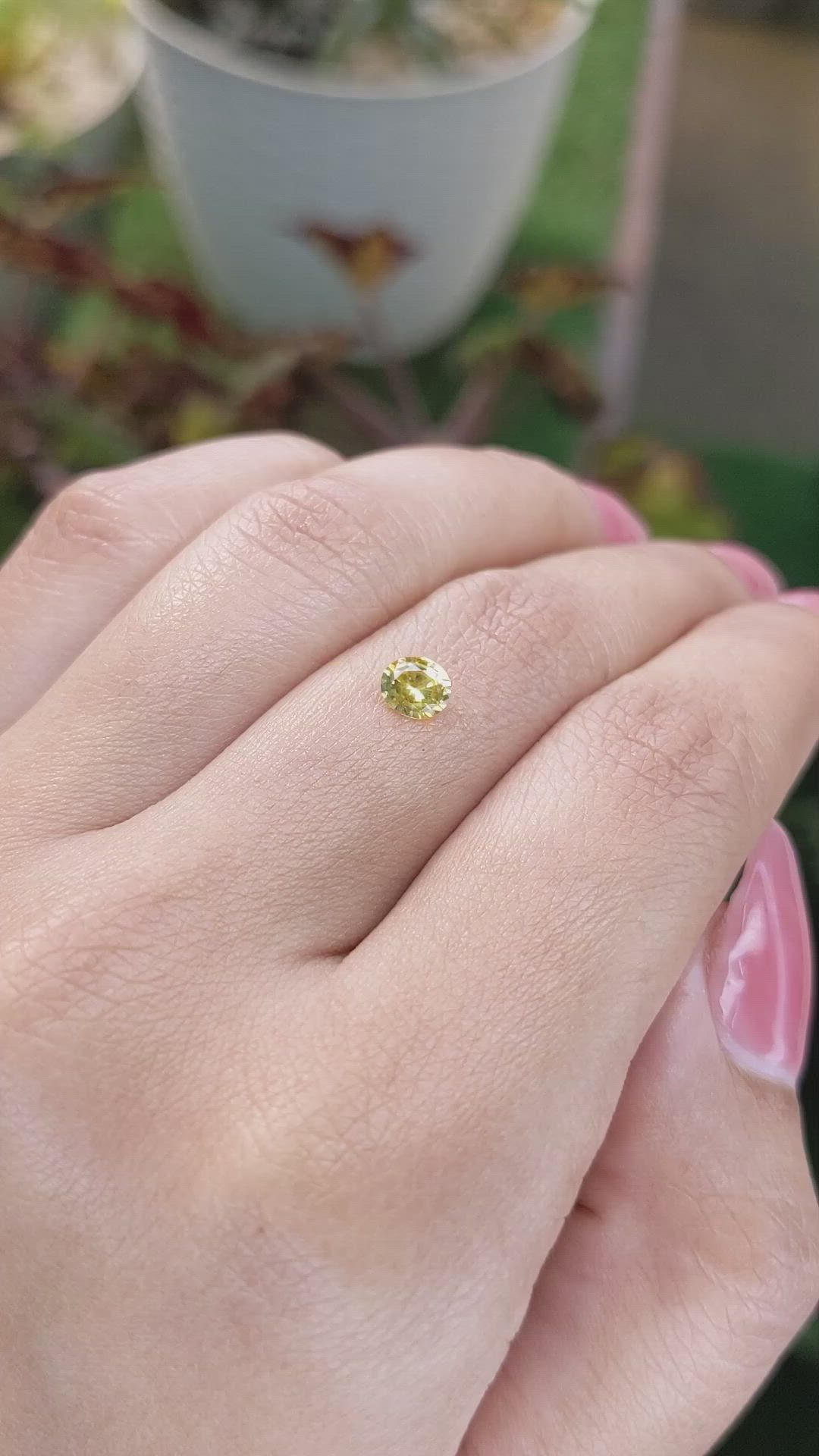 0.39 Ct. Orangish Yellow Sapphire from Ceylon (Sri Lanka) Size Video