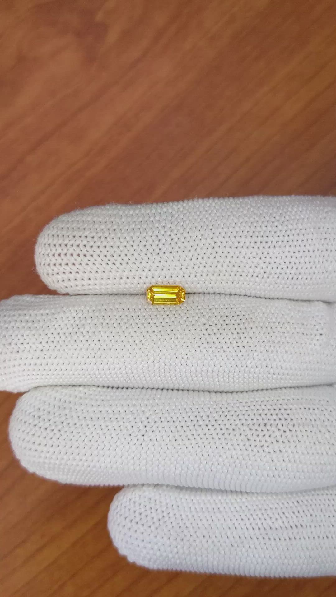 0.61 Ct. Yellowish Orange Sapphire from Ceylon (Sri Lanka) Size Video