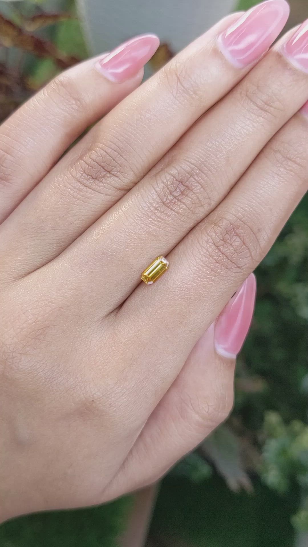 0.61 Ct. Yellowish Orange Sapphire from Ceylon (Sri Lanka) Size Video