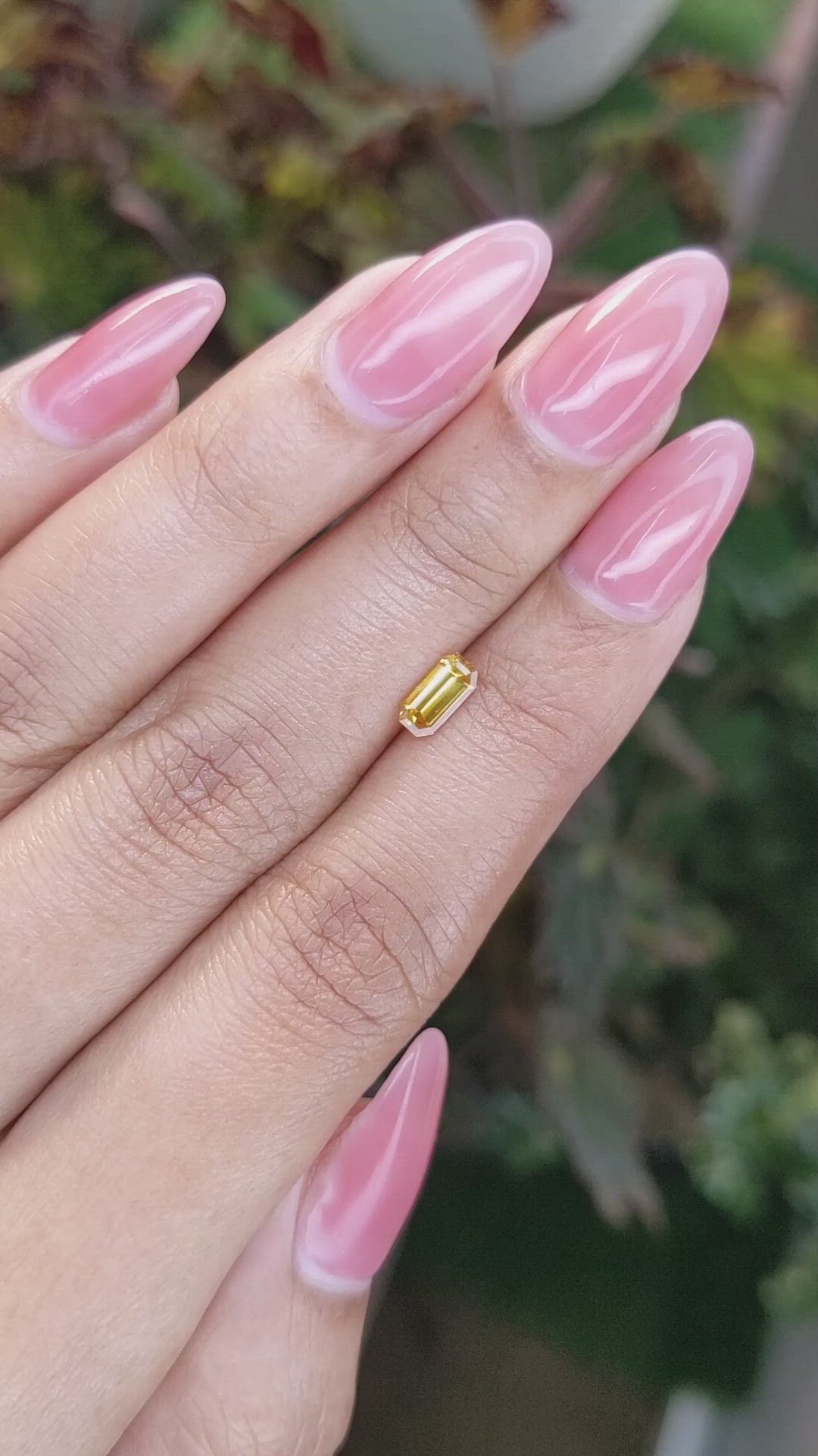 0.61 Ct. Yellowish Orange Sapphire from Ceylon (Sri Lanka) Size Video