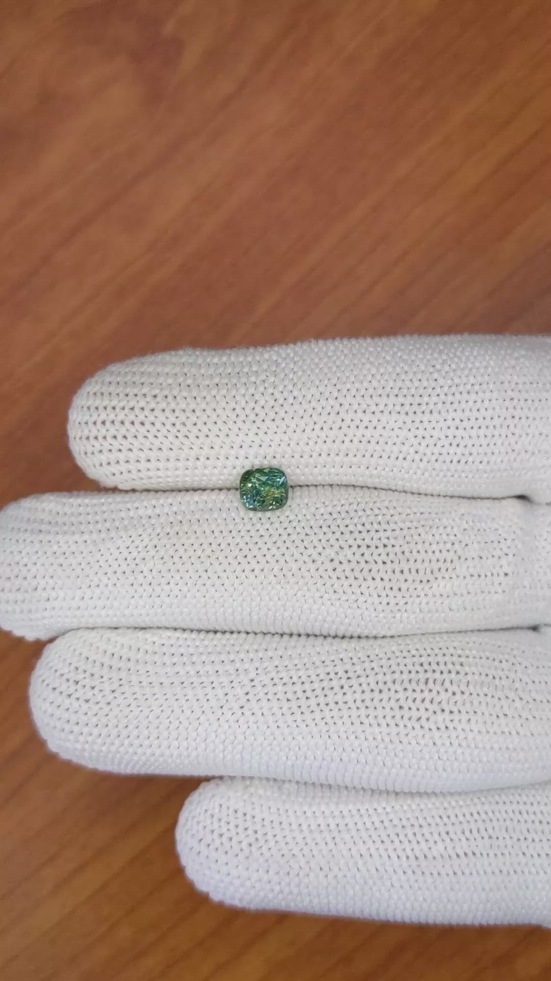 0.97 Ct. Bluish Green Sapphire from Madagascar Size Video
