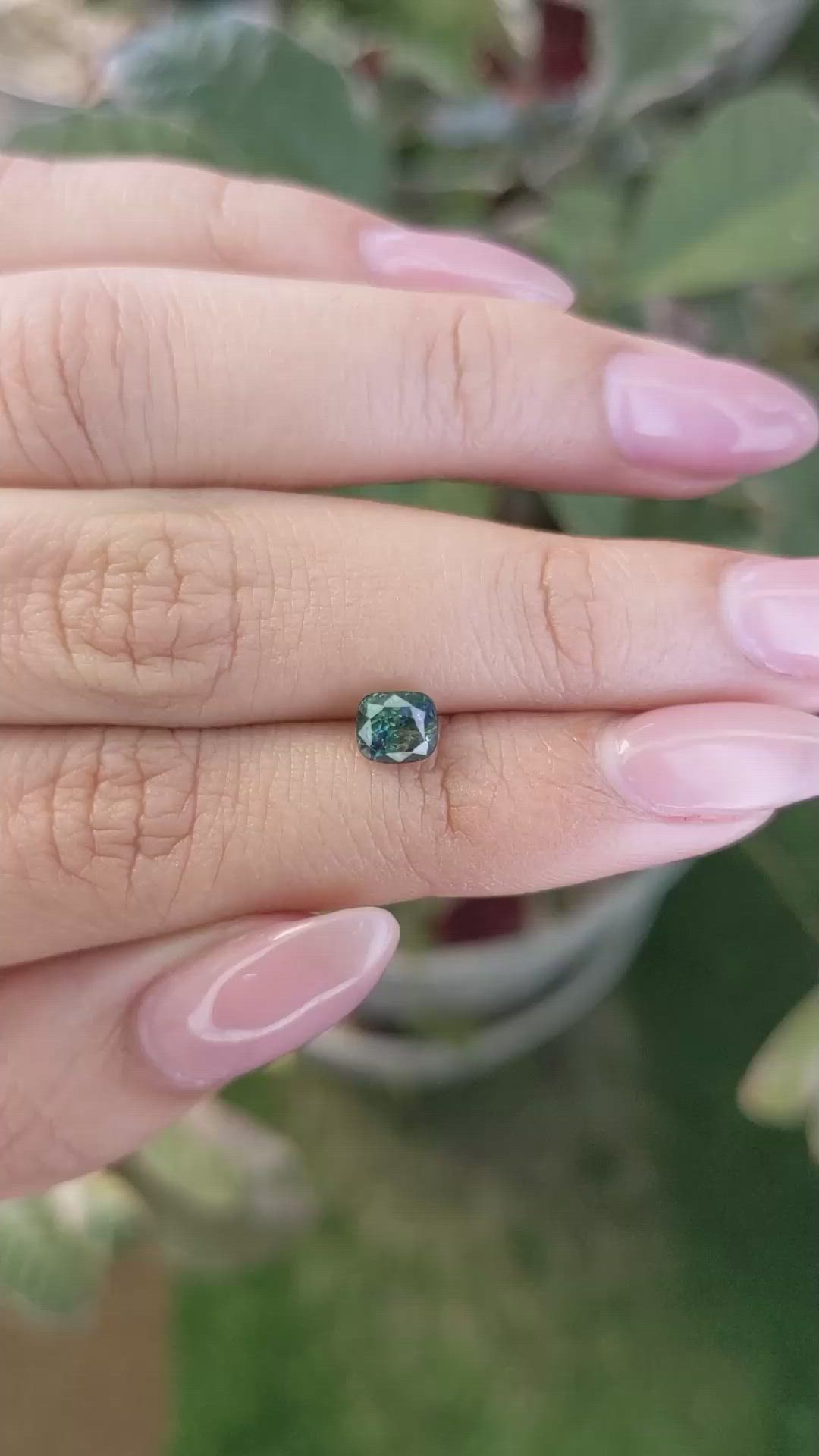0.97 Ct. Bluish Green Sapphire from Madagascar Size Video