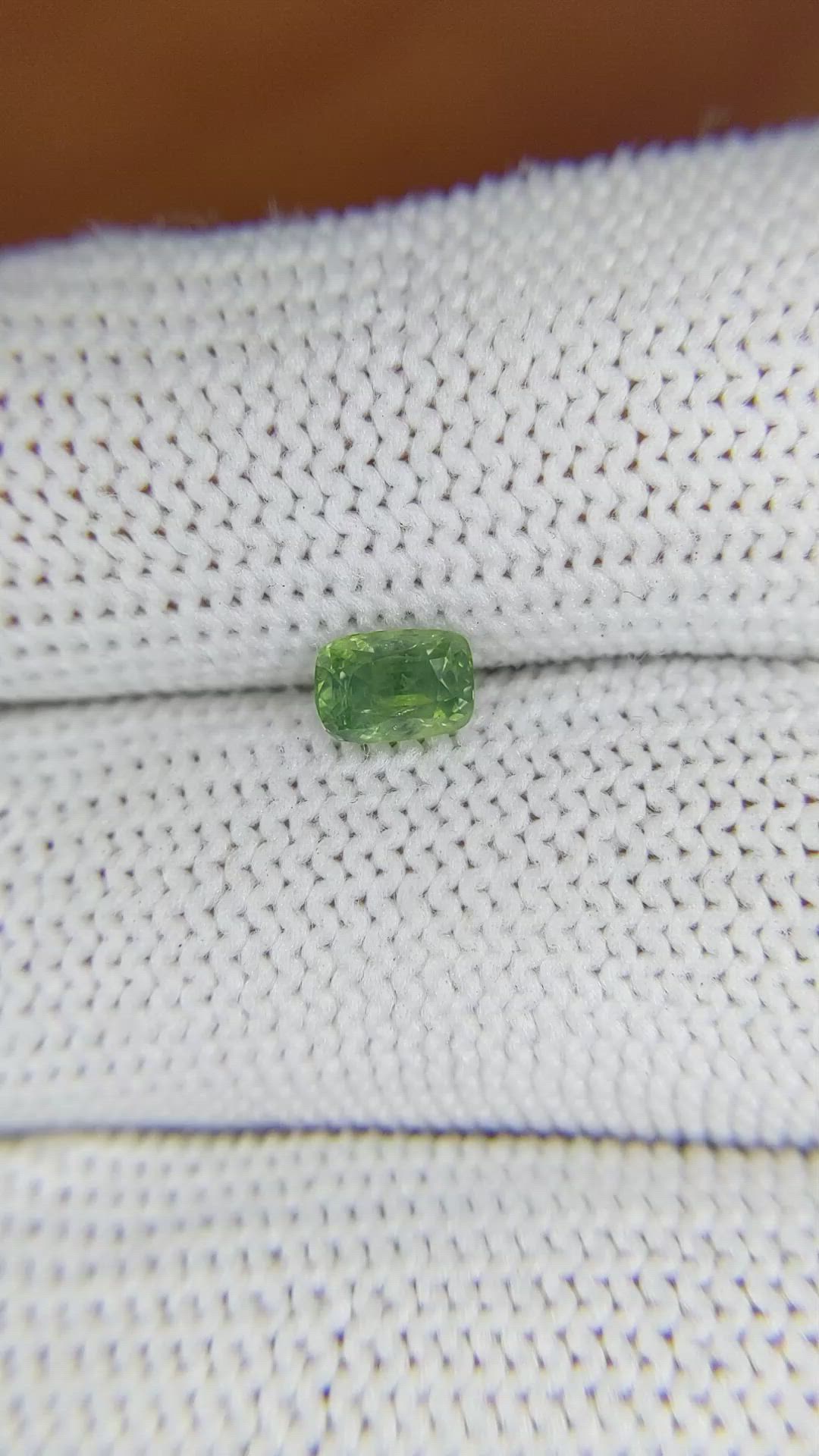 0.74 Ct. Yellowish Green Sapphire from Madagascar Size Video