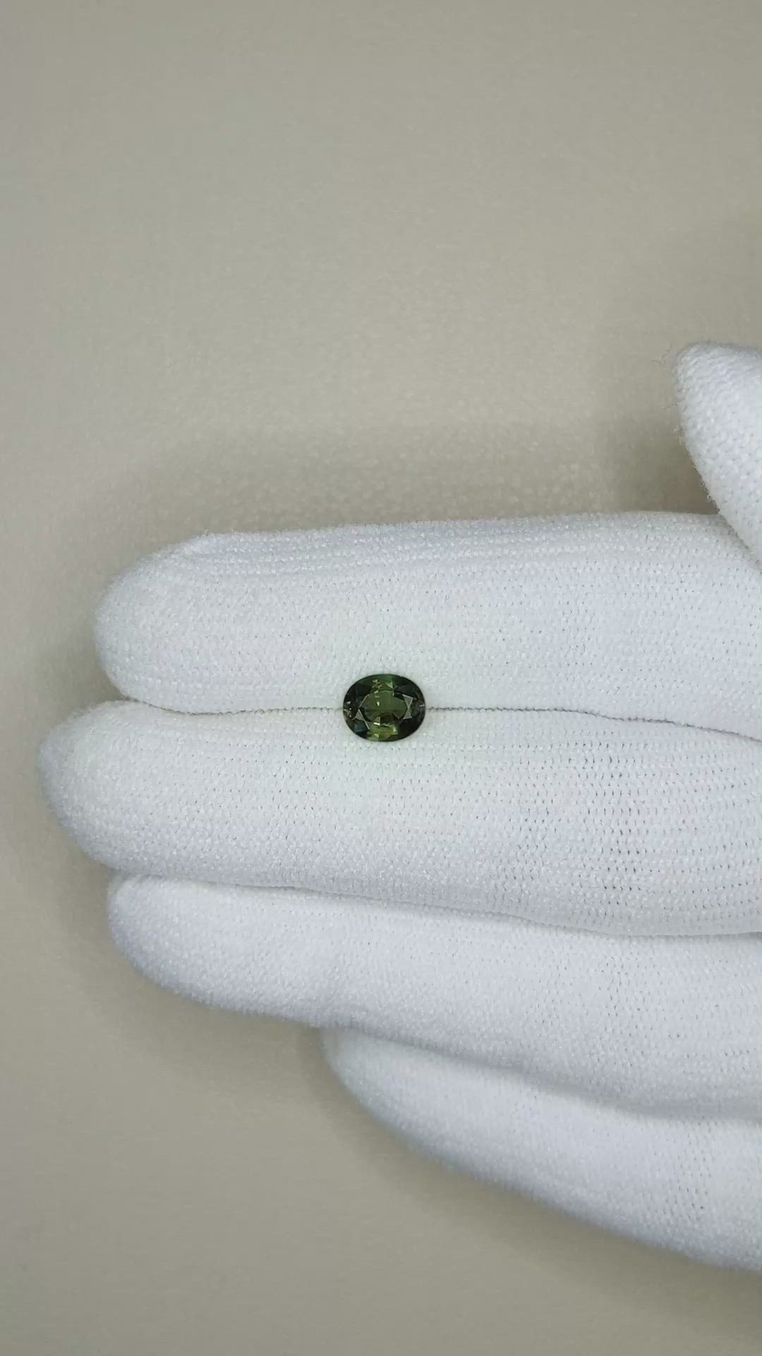 0.91 Ct. Bluish Green Sapphire from Thailand Size Video