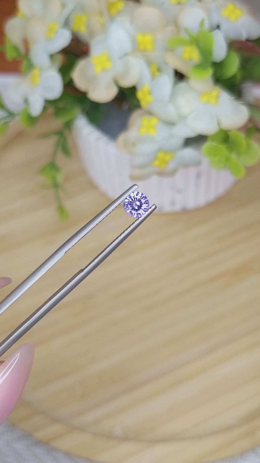 0.61 Ct. Pinkish Purple Sapphire from Ceylon (Sri Lanka) Size Video