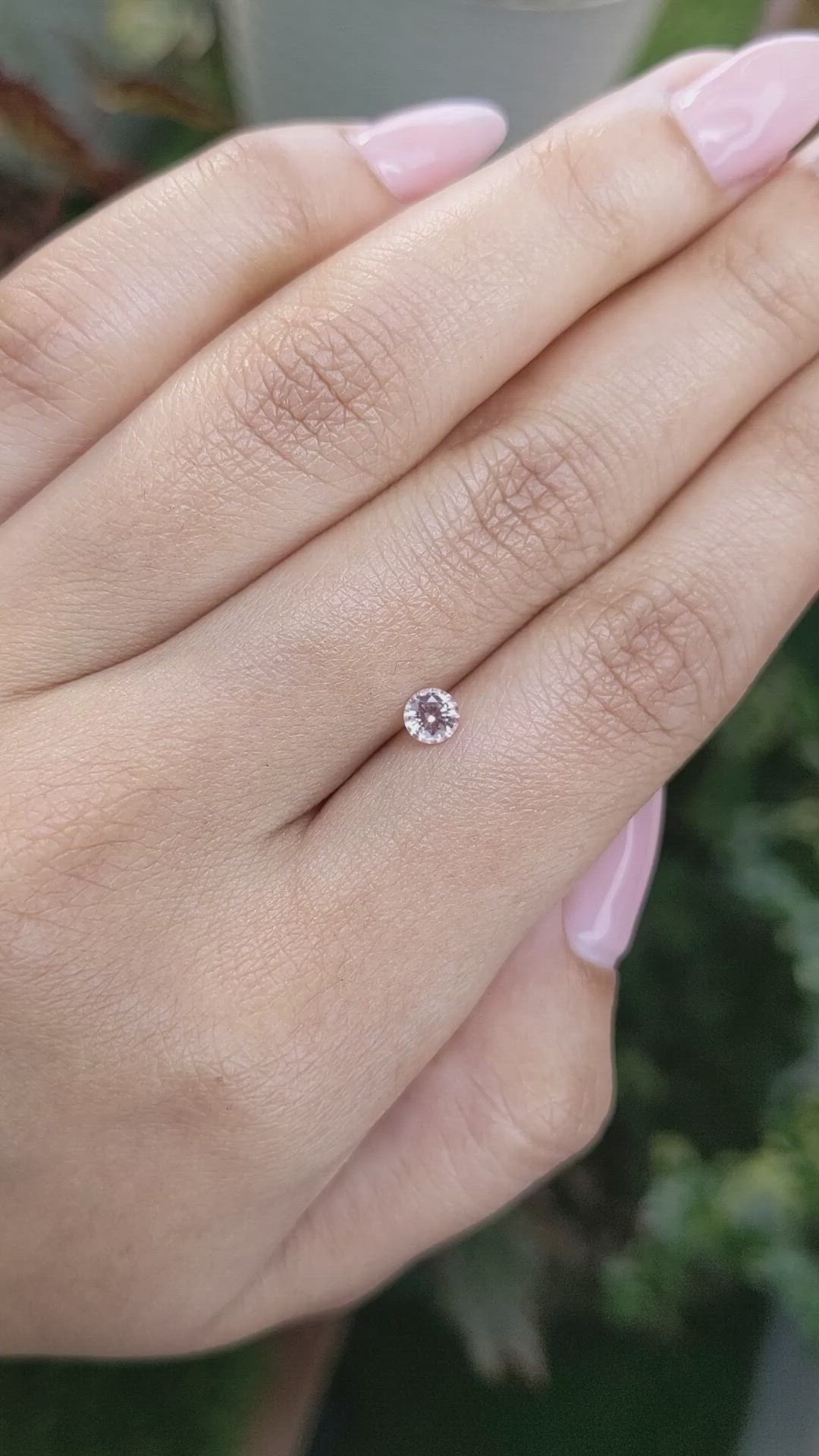 0.35 Ct. Peach Sapphire from Ceylon (Sri Lanka) Size Video