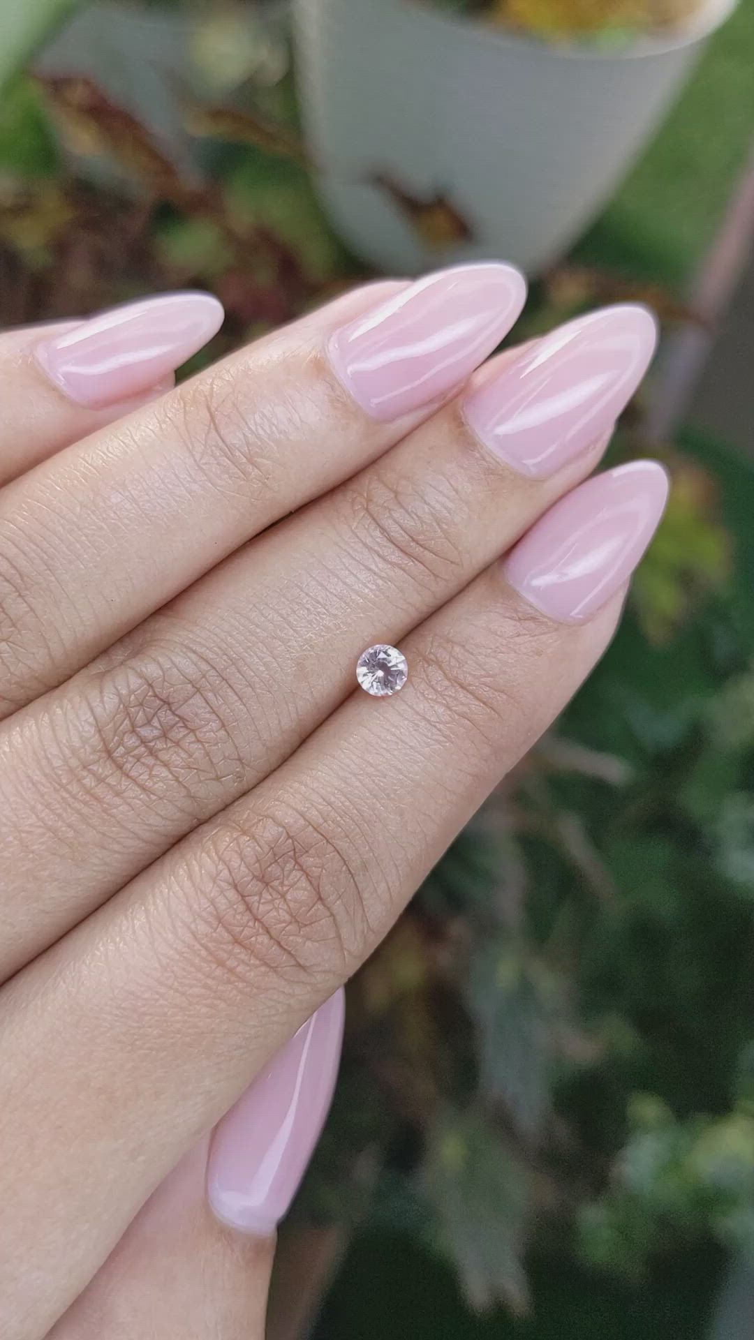 0.35 Ct. Peach Sapphire from Ceylon (Sri Lanka) Size Video