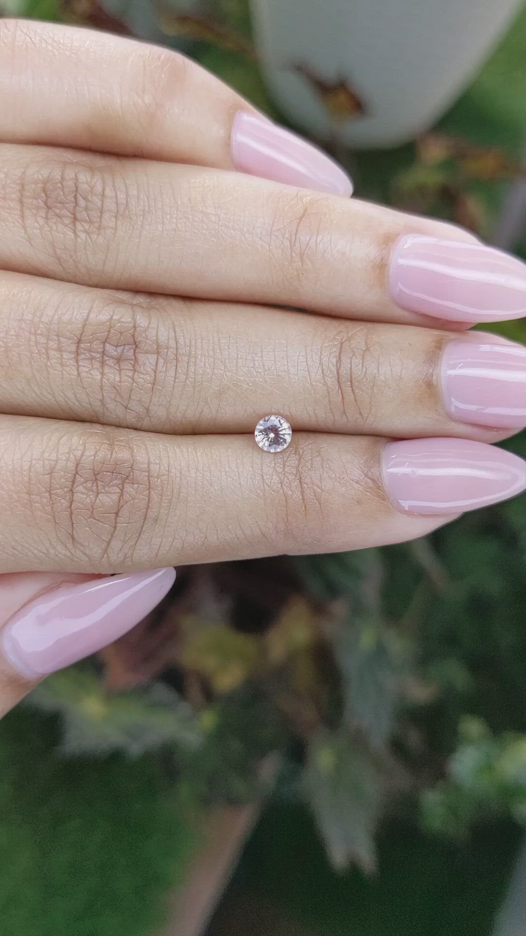0.35 Ct. Peach Sapphire from Ceylon (Sri Lanka) Size Video