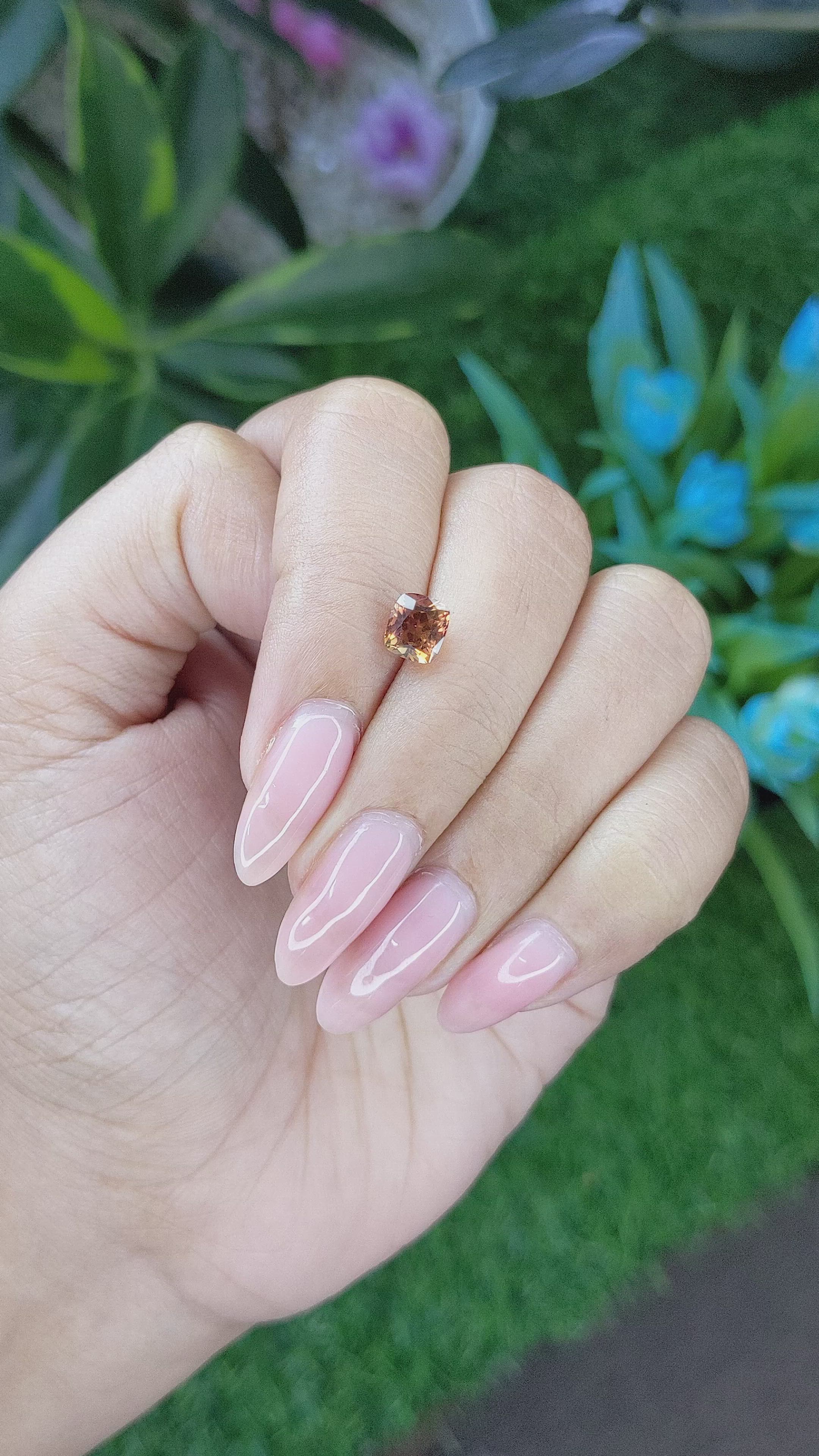 1.33 Ct. Orangish Brown Sapphire from Tanzania Size Video