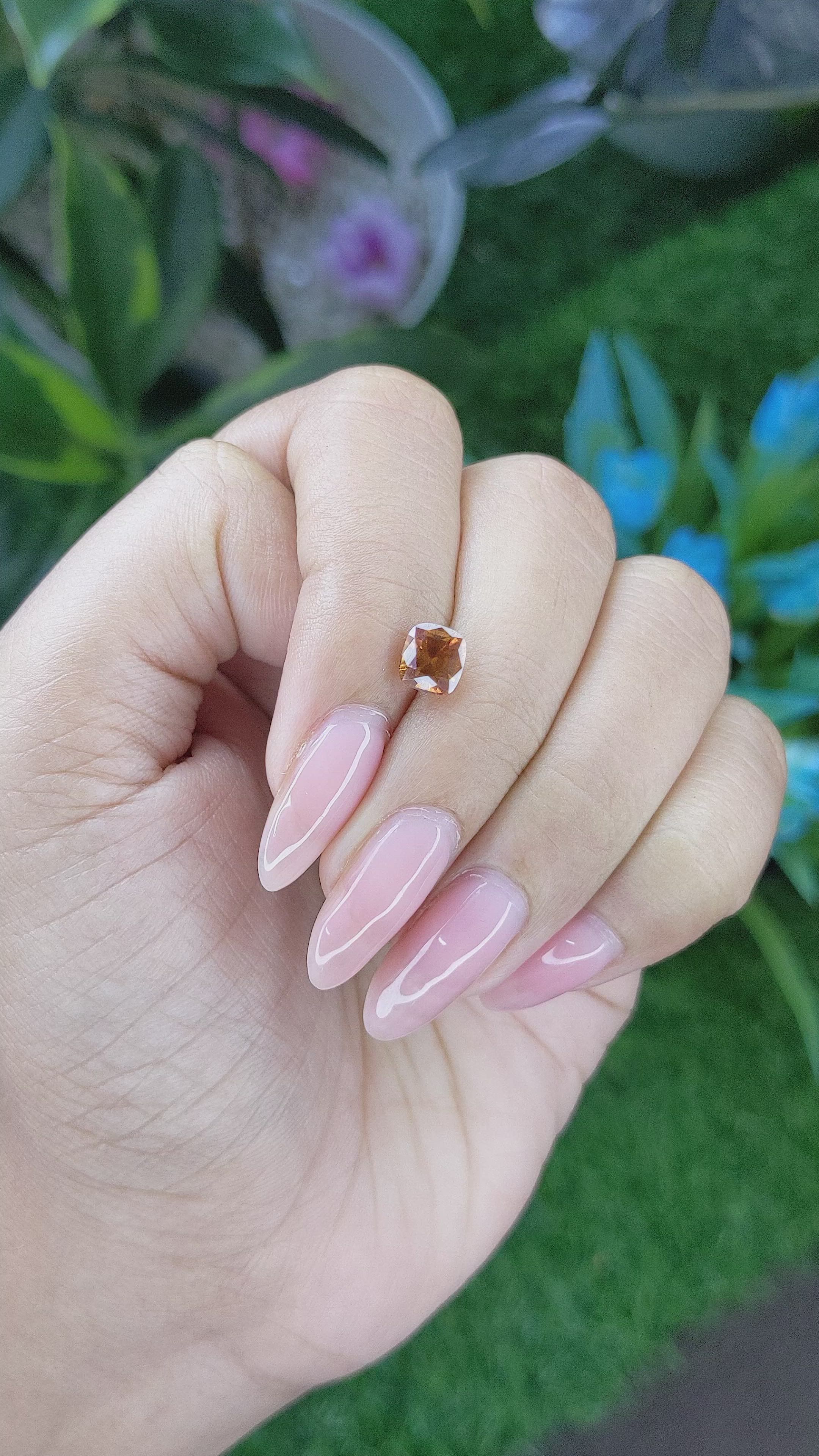 1.36 Ct. Orangish Brown Sapphire from Tanzania Size Video