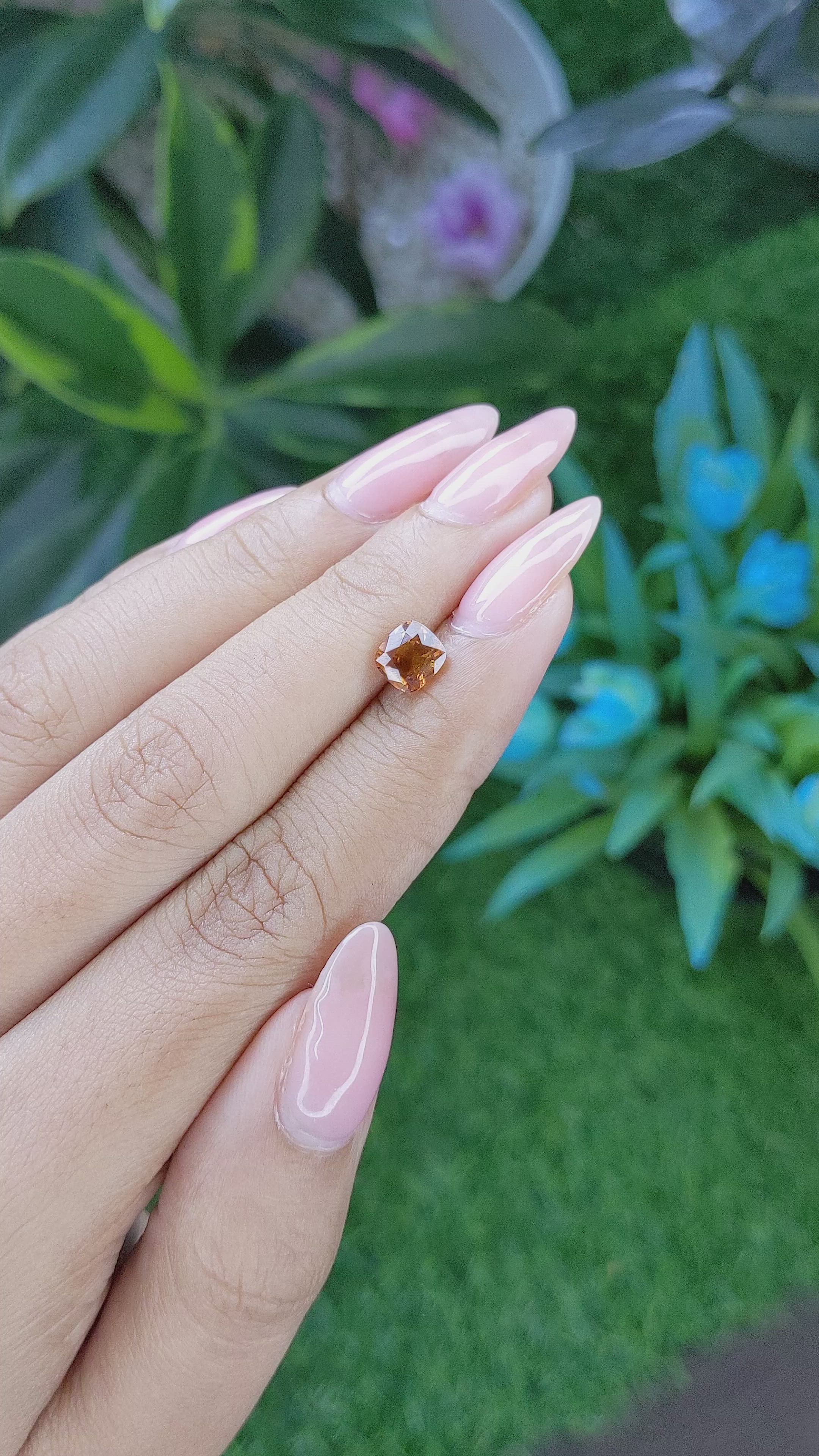 1.36 Ct. Orangish Brown Sapphire from Tanzania Size Video